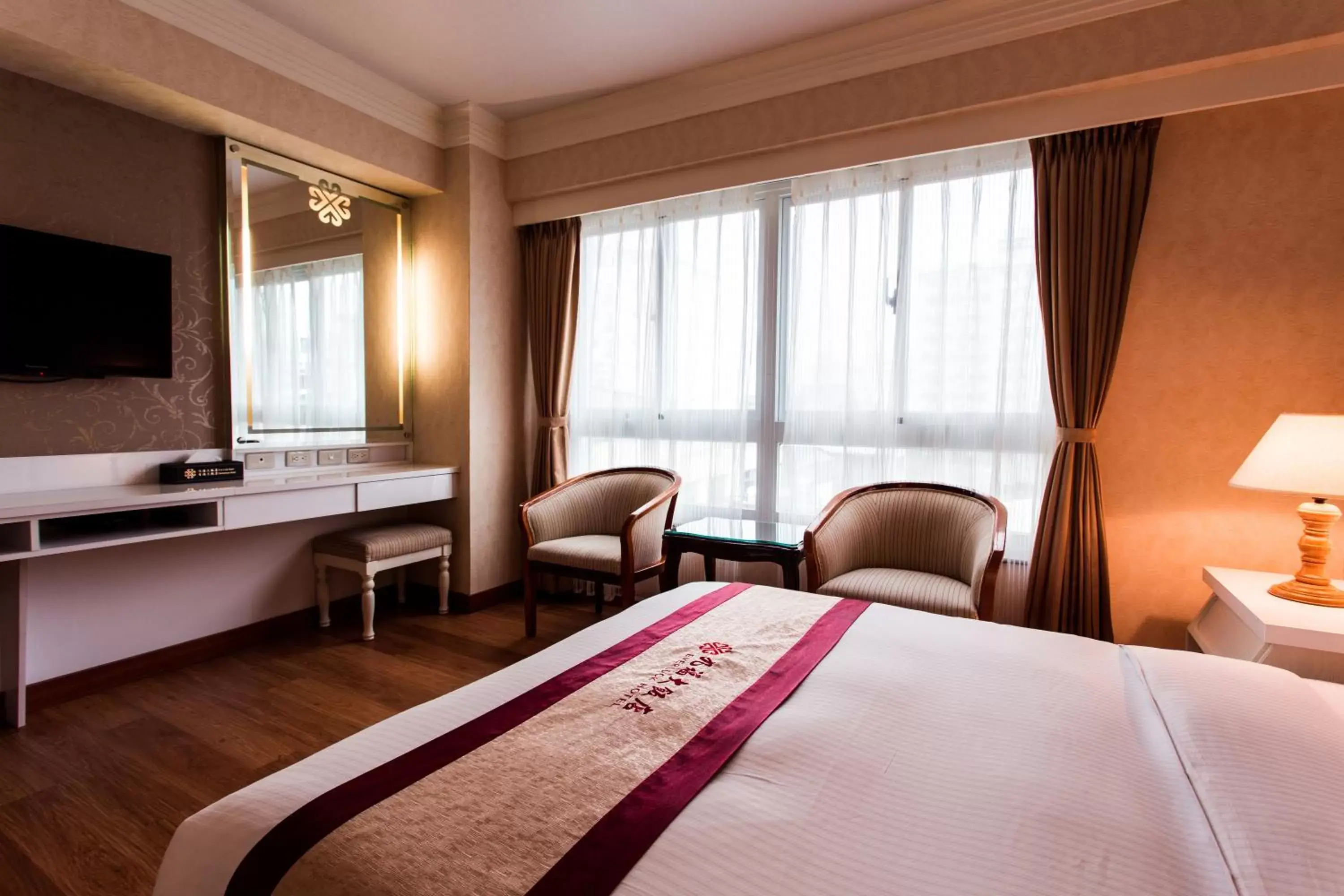 Bed in Ever Luck Hotel Bed in Ever Luck Hotel