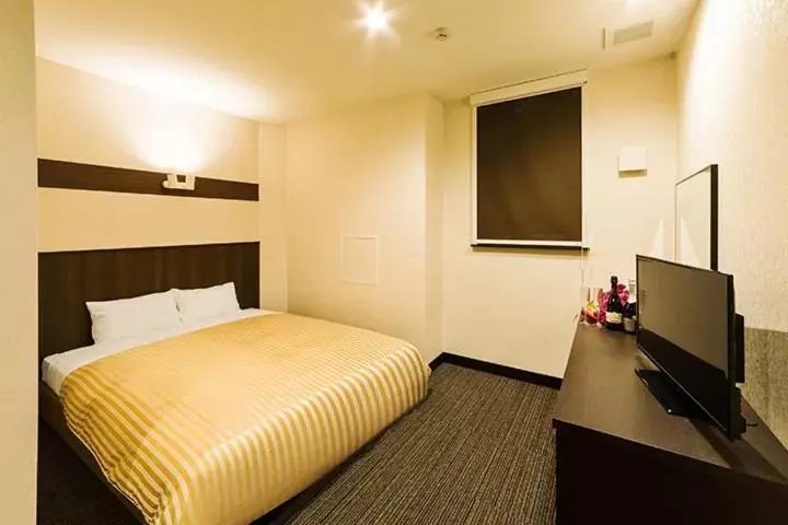 Bed in Hotel CASVI Tenjin