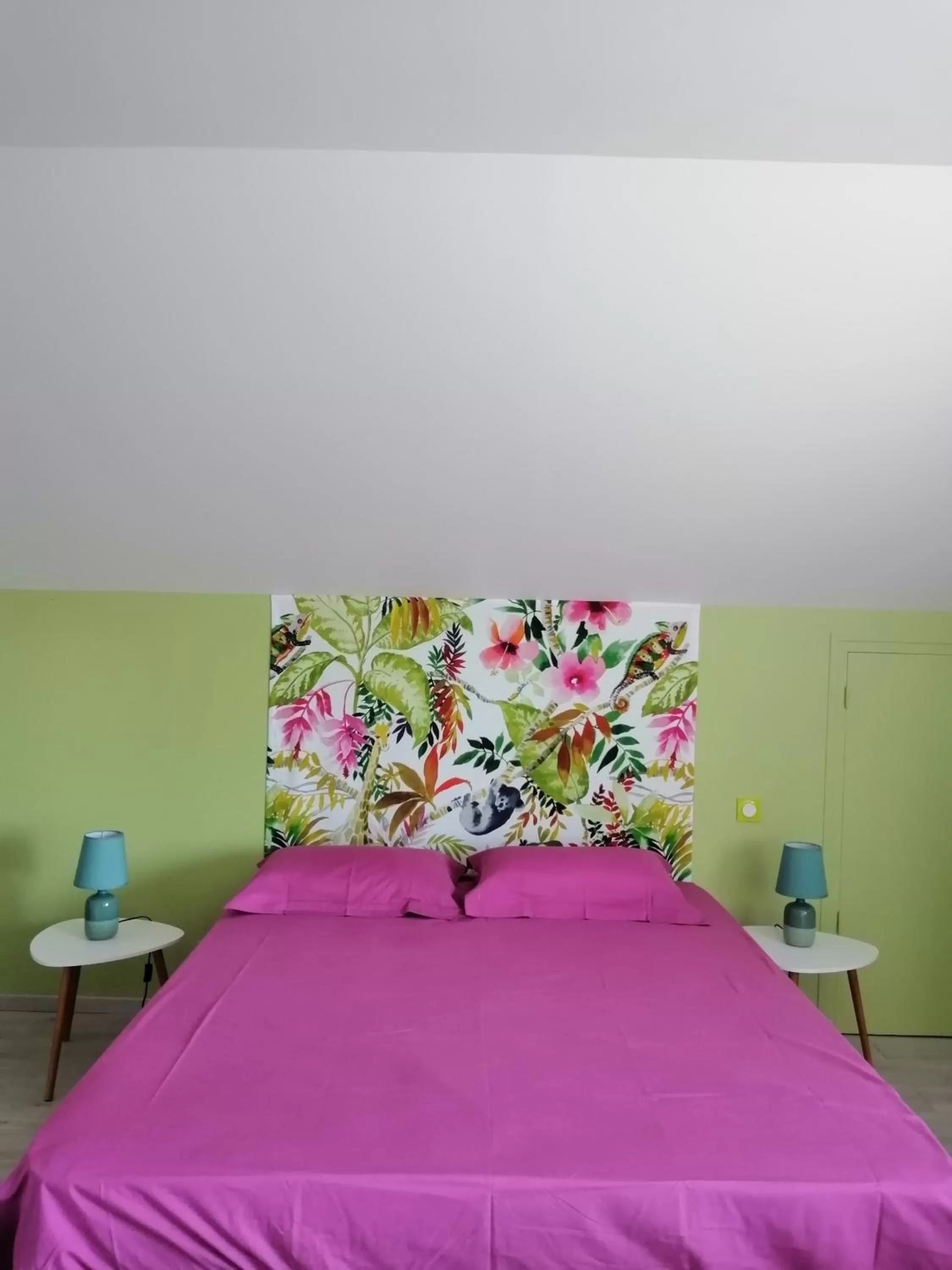 Bed in CHAMBRES D HÔTES CHEZ SYLVIE et Daniel