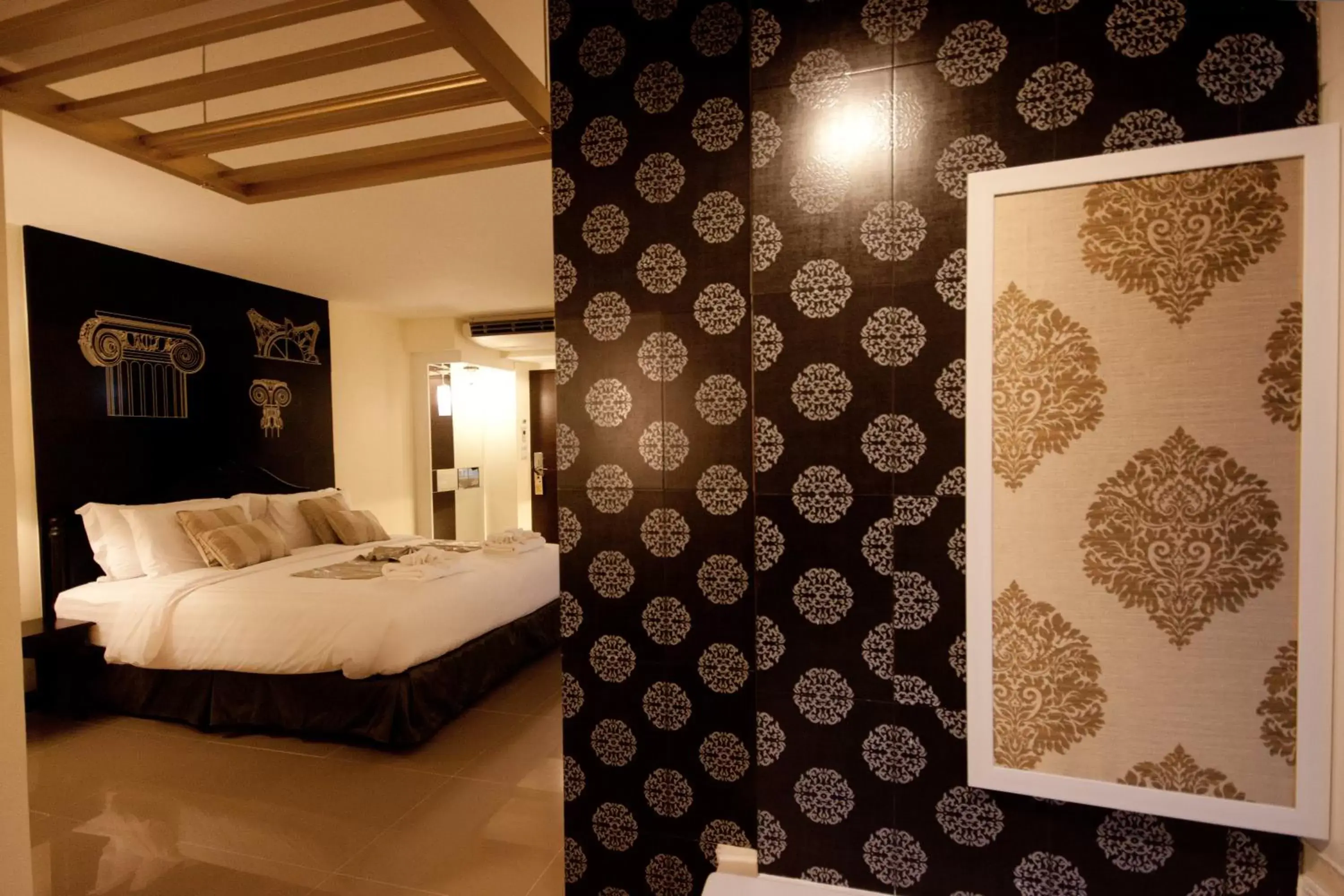 Bed in Nimman Mai Design Hotel Chiang Mai - SHA Plus