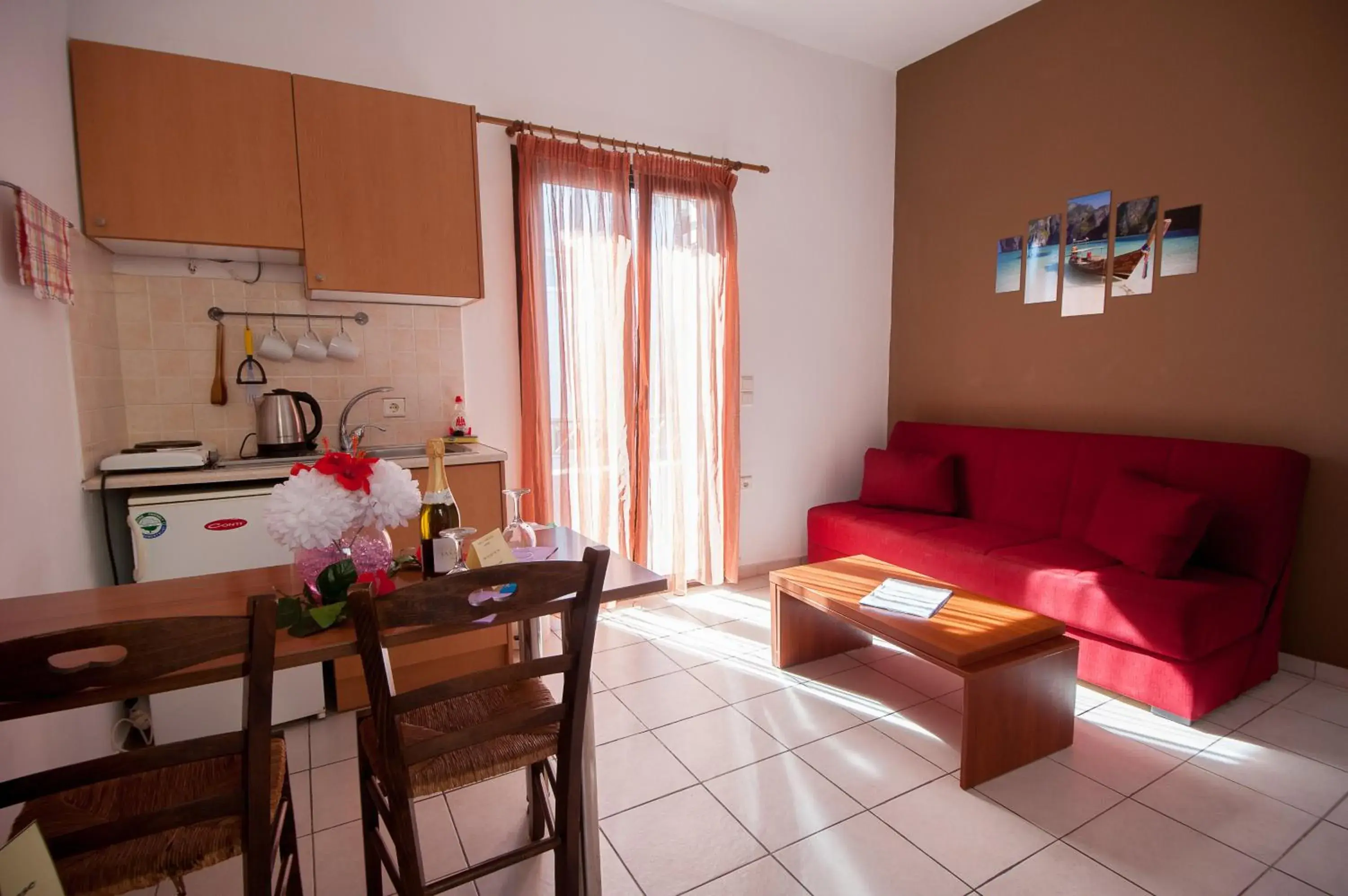 Kitchen or kitchenette, Dining Area in Elounda Sunrise Apartments