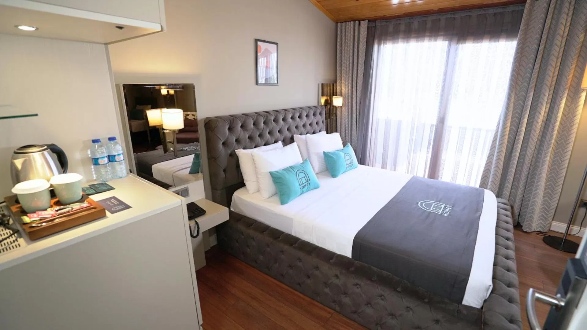 Bed in Homey AirPort Hotel