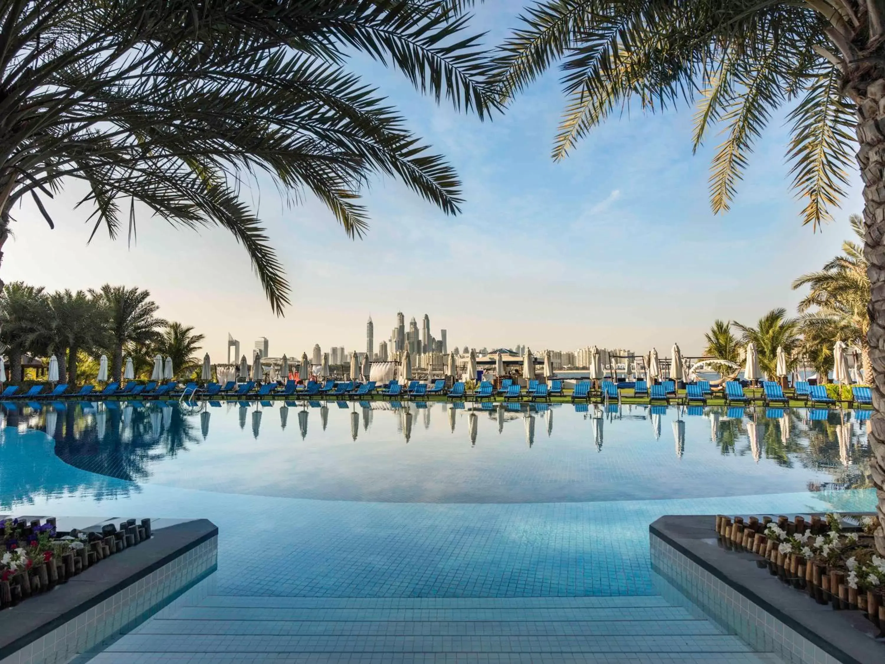 Property building, Swimming Pool in Rixos The Palm Hotel & Suites - Ultra All Inclusive