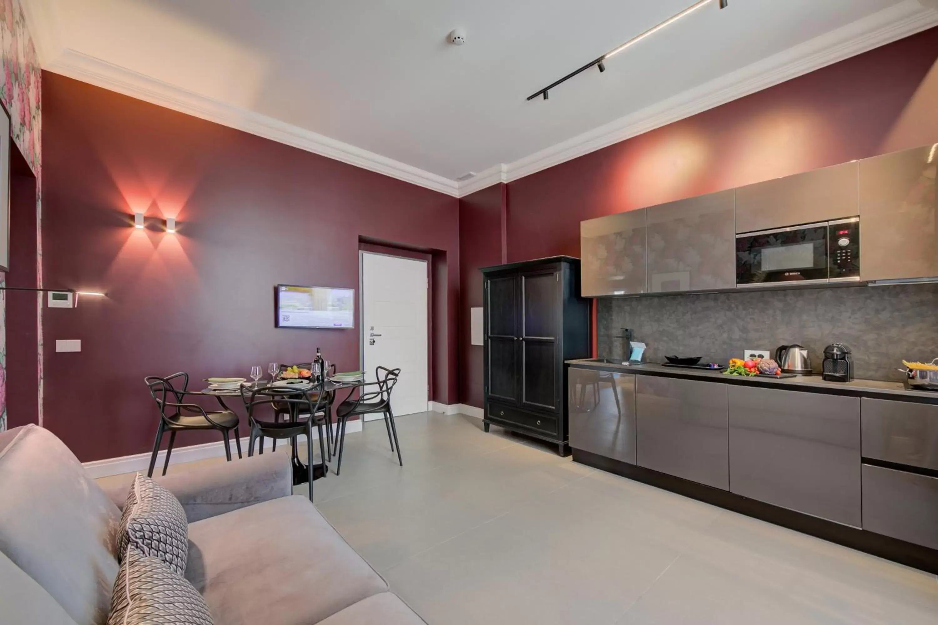 Living room, Kitchen/Kitchenette in Boutique Central Apartments- Happy Rentals