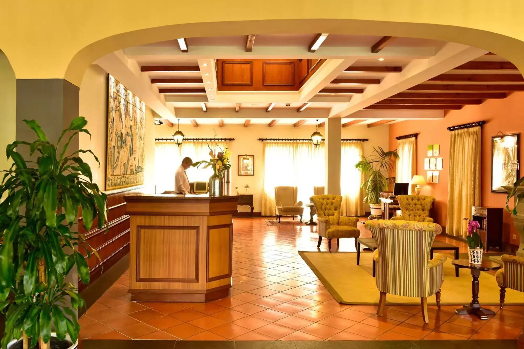 Communal lounge/ TV room in Pestana Village Garden Hotel