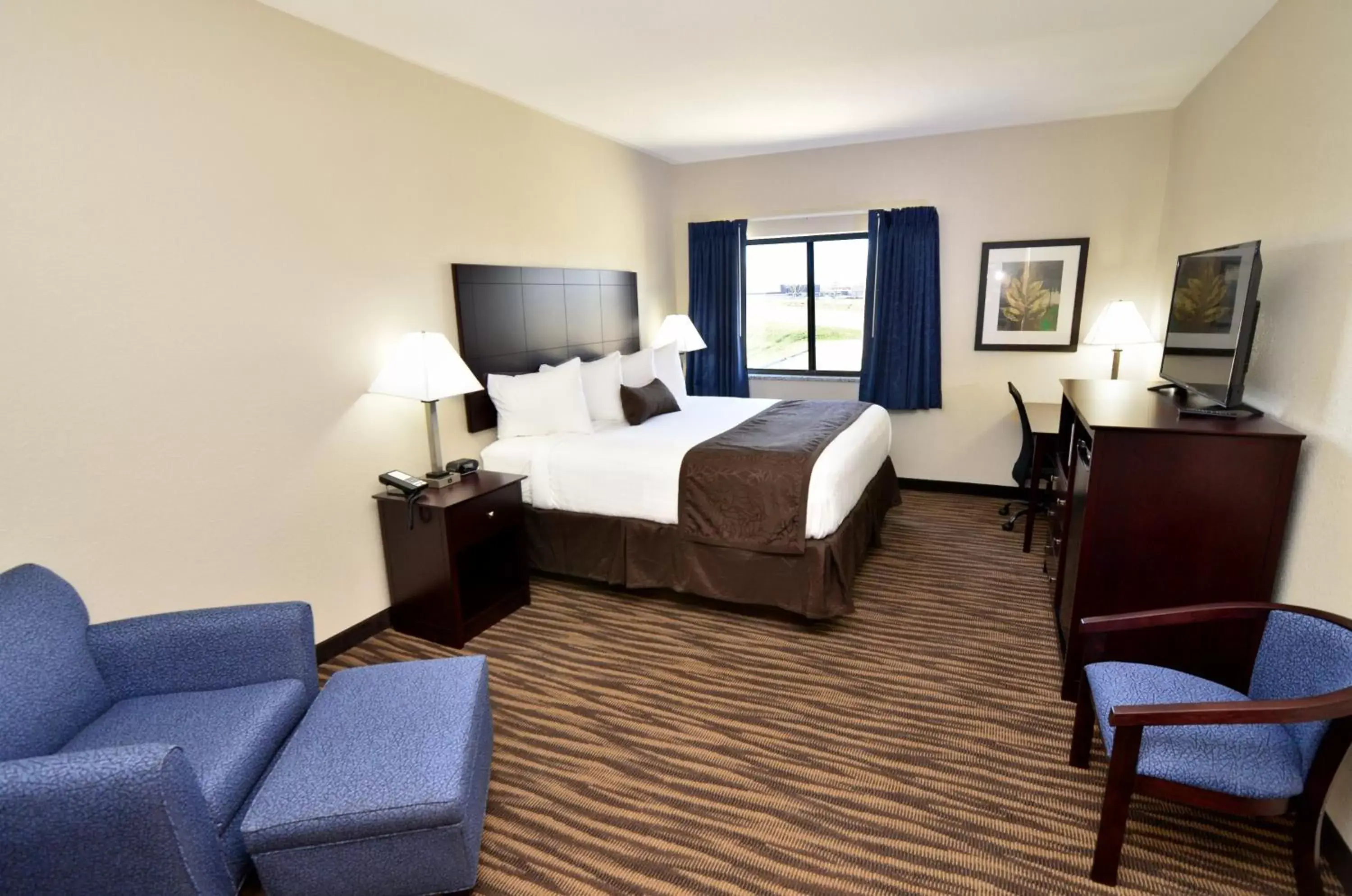 Bed in Cobblestone Inn & Suites - Manning