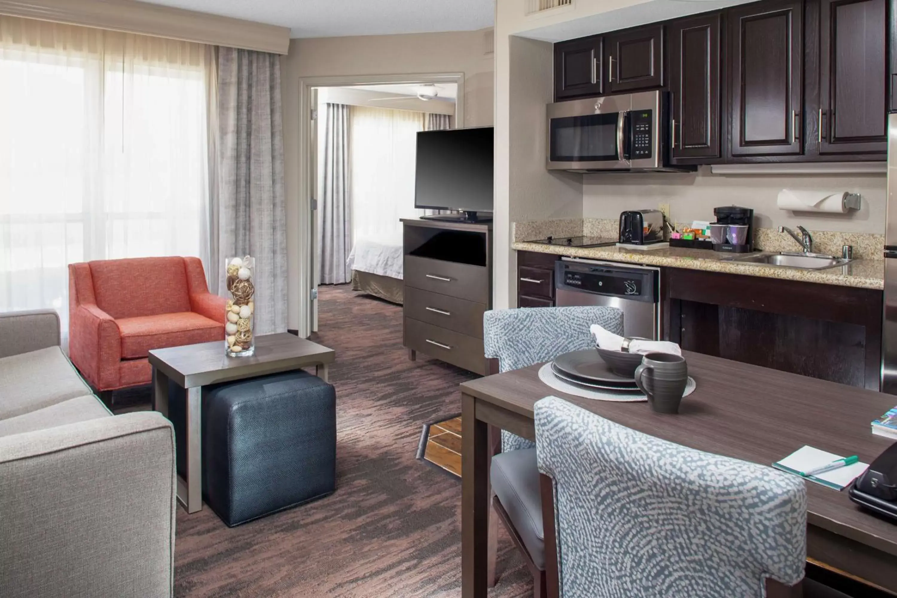 Living room in Homewood Suites by Hilton Dallas-Irving-Las Colinas Living room in Homewood Suites by Hilton Dallas-Irving-Las Colinas