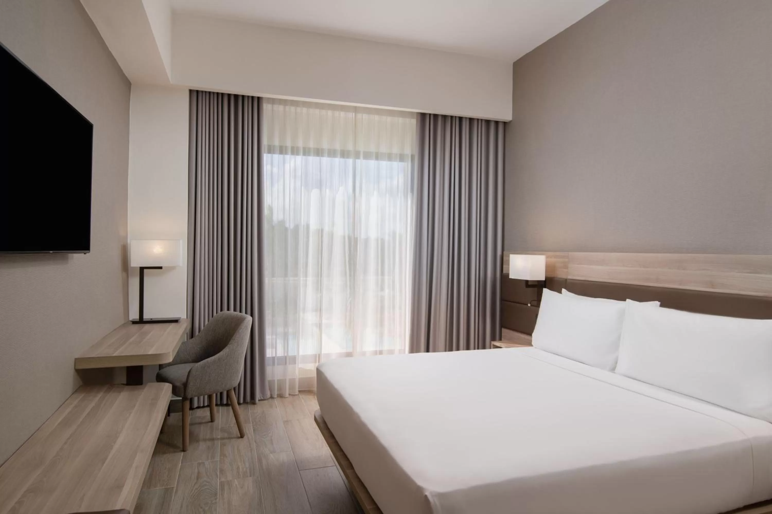 Photo of the whole room, Bed in AC Hotel by Marriott Punta Cana