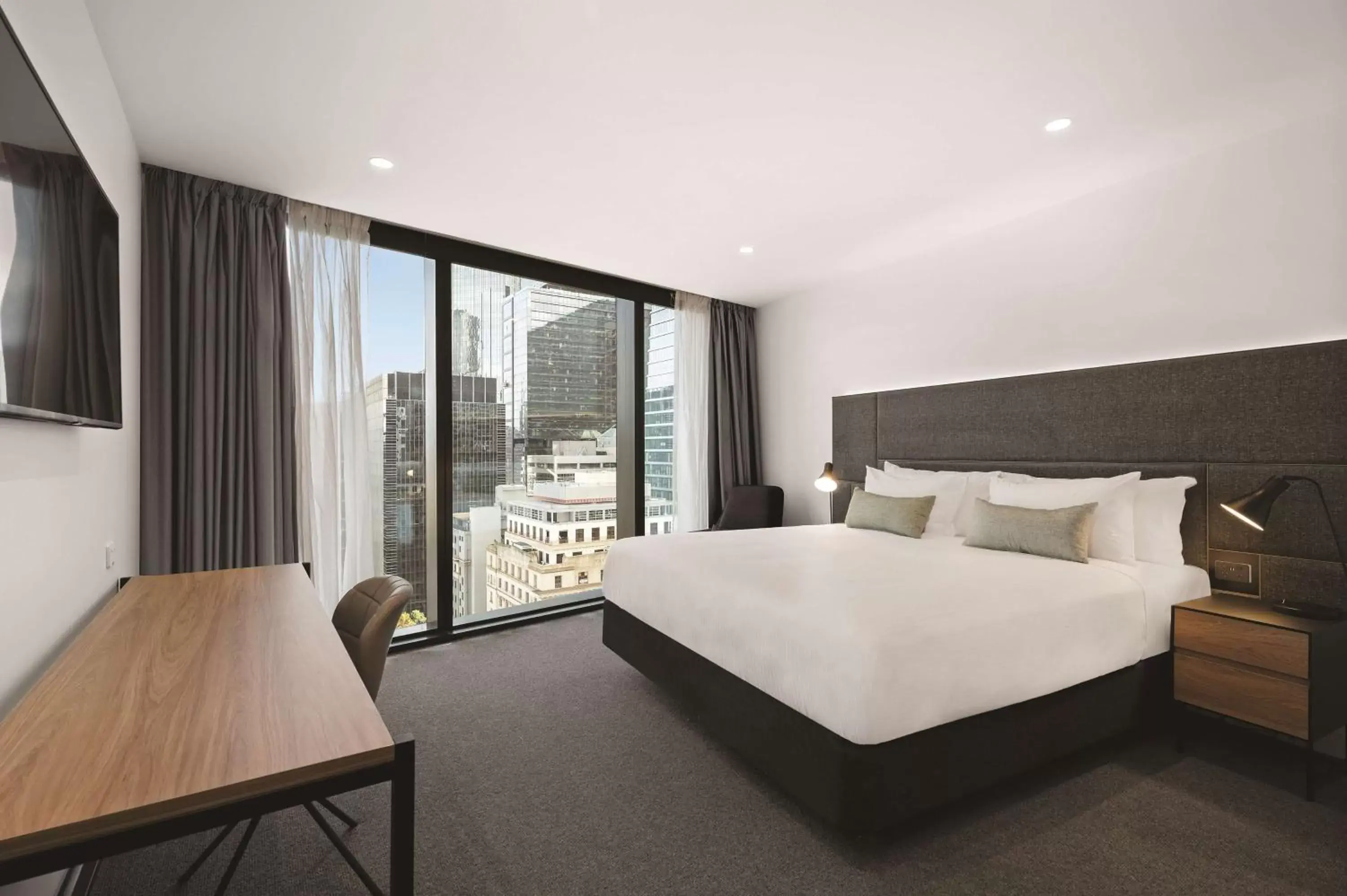 Bedroom in Vibe Hotel Melbourne