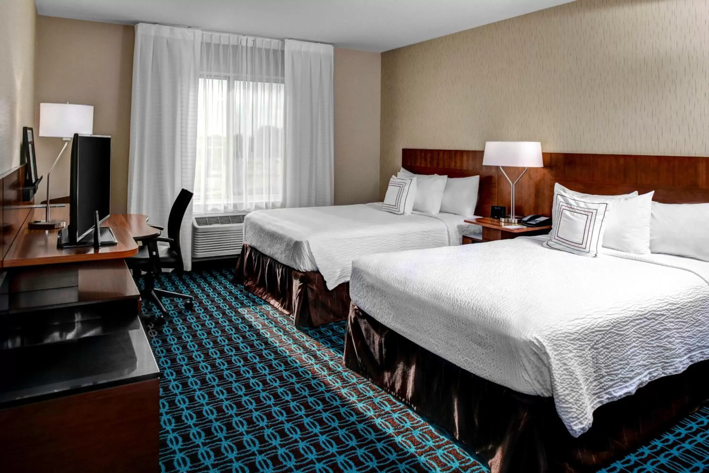 Photo of the whole room, Bed in Fairfield Inn & Suites by Marriott Lansing at Eastwood