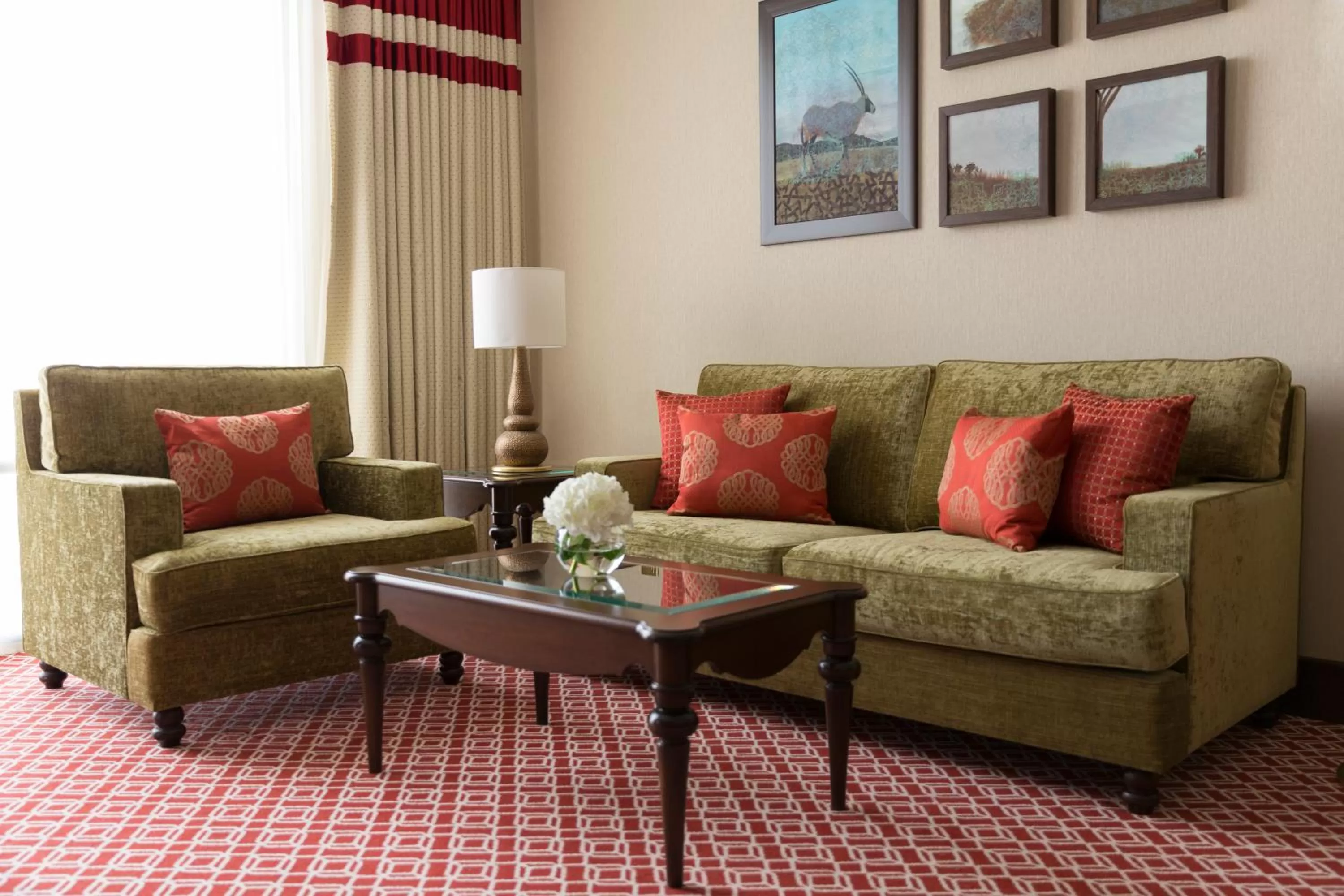 Living room in Al Najada Doha Hotel by Tivoli