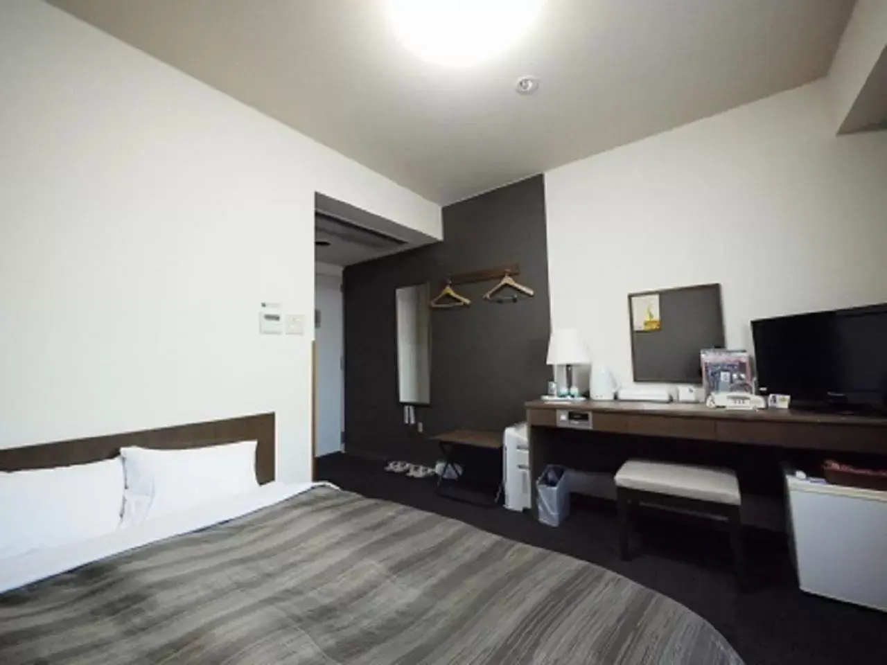 Photo of the whole room, Bed in Hotel Route-Inn Myoko Arai