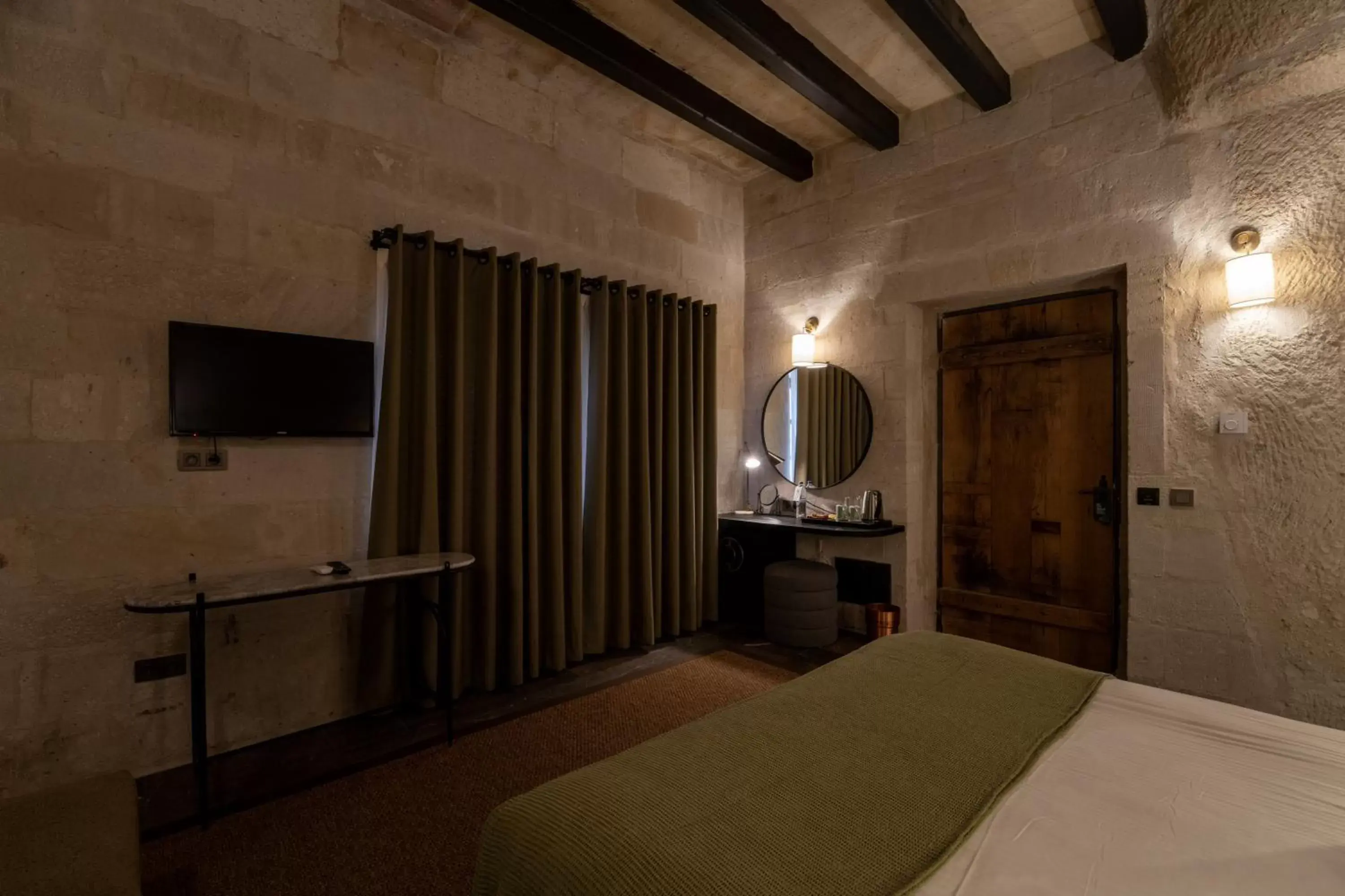 Bedroom, Bed in Artemis Cave Suites & Spa- Adults Only