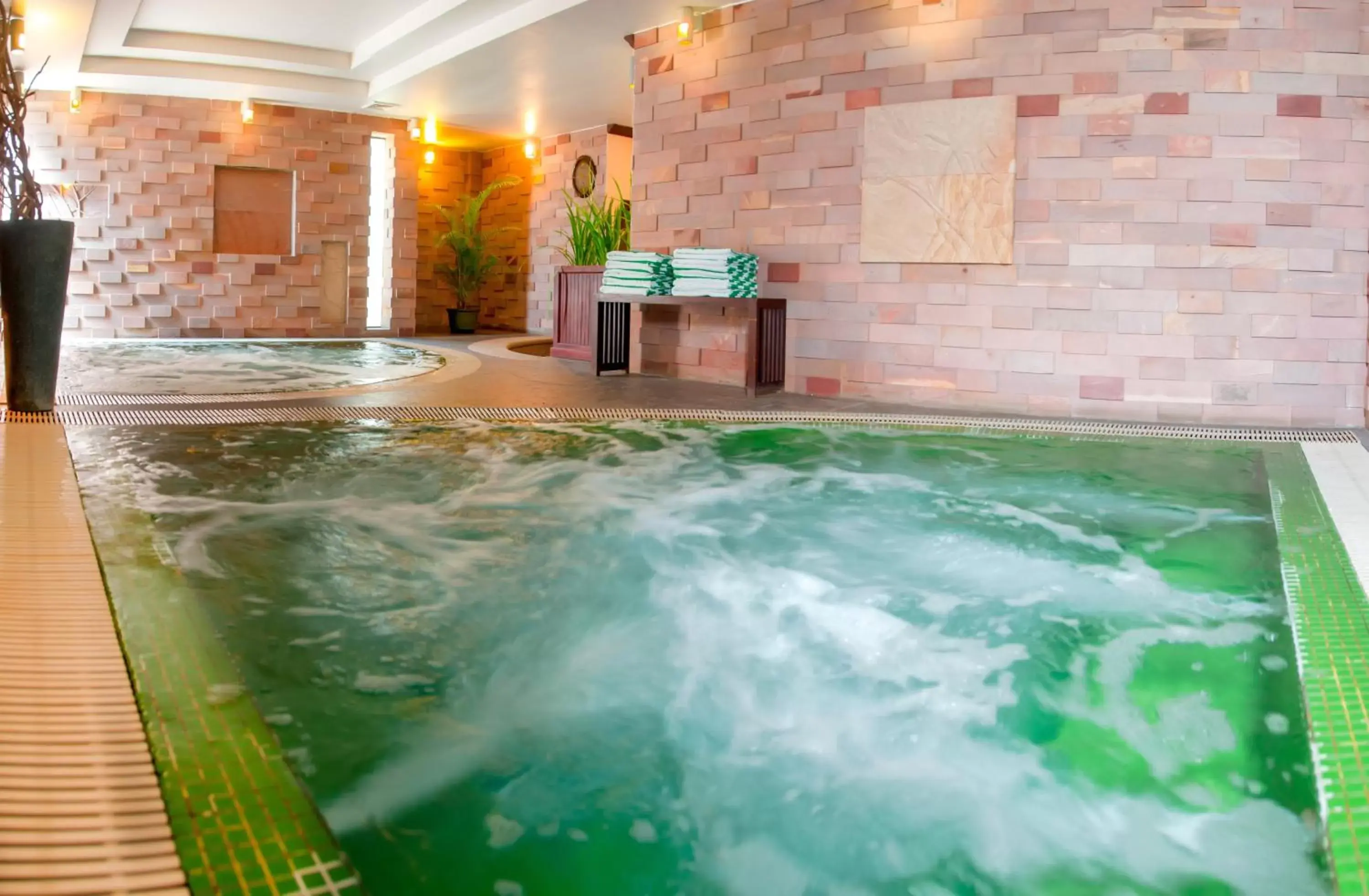 Hot Spring Bath, Swimming Pool in THE PRIVILEGE FLOOR by Borei Angkor