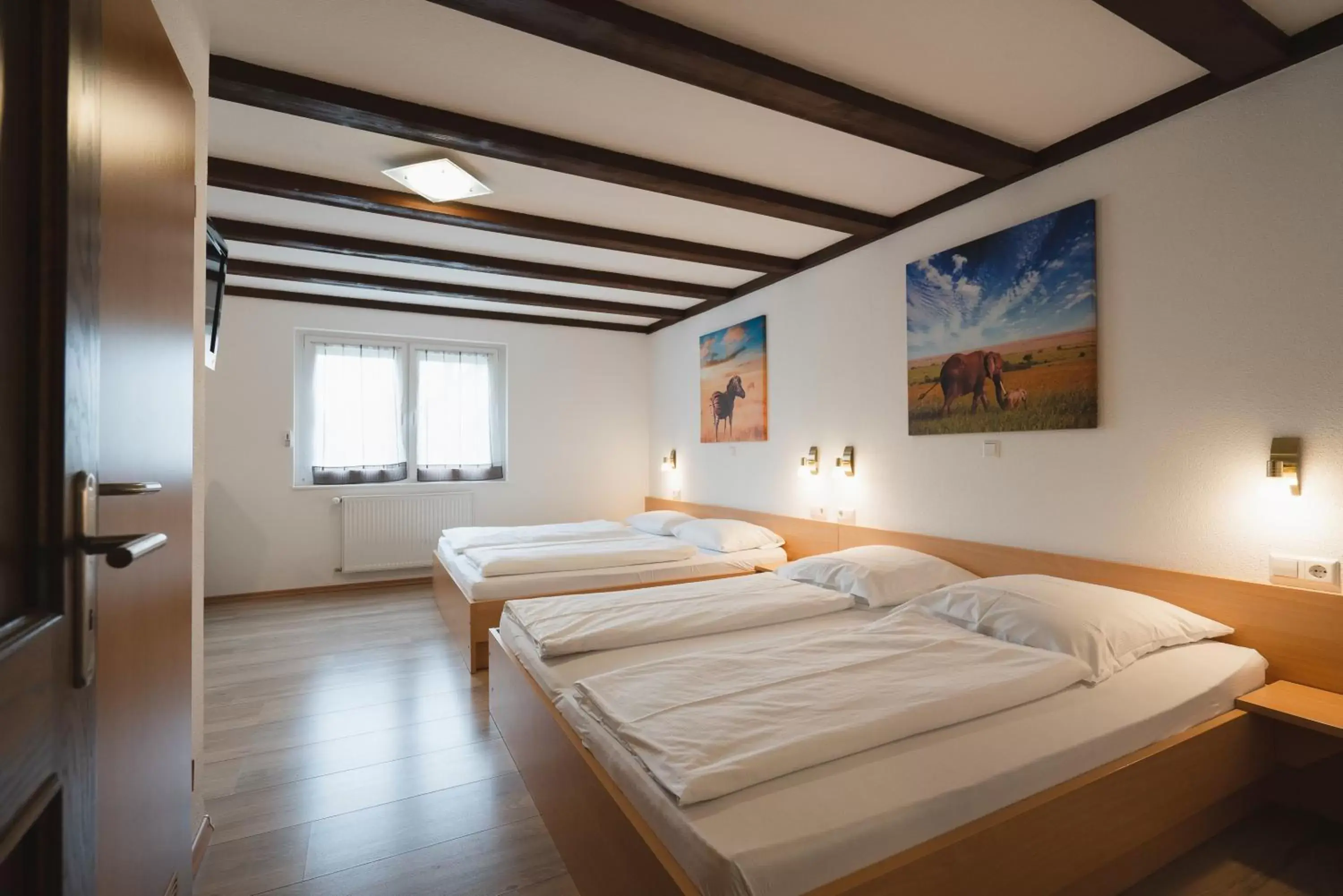 Comfort Quadruple Room in Park Hotel & Gästehaus Rust Comfort Quadruple Room in Park Hotel & Gästehaus Rust