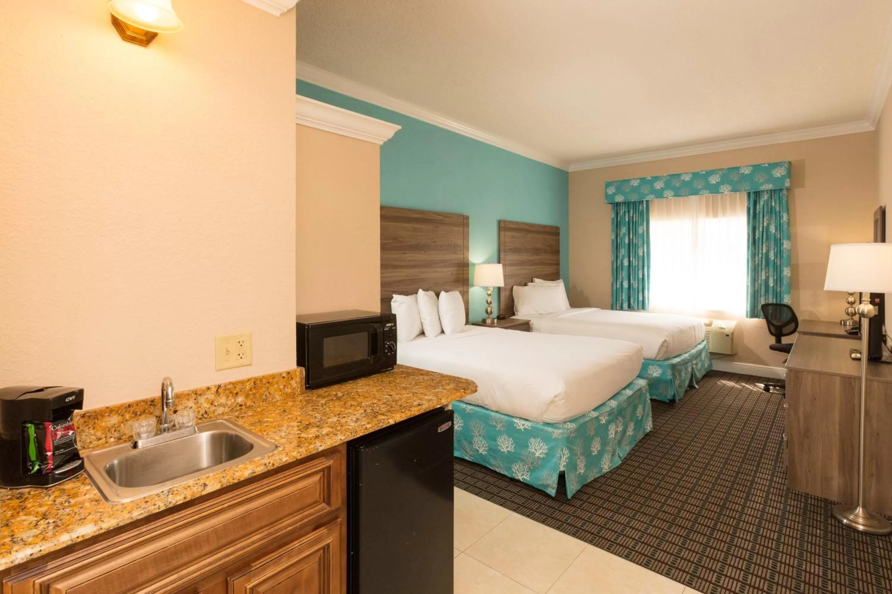 Bed in Amelia Hotel at the Beach