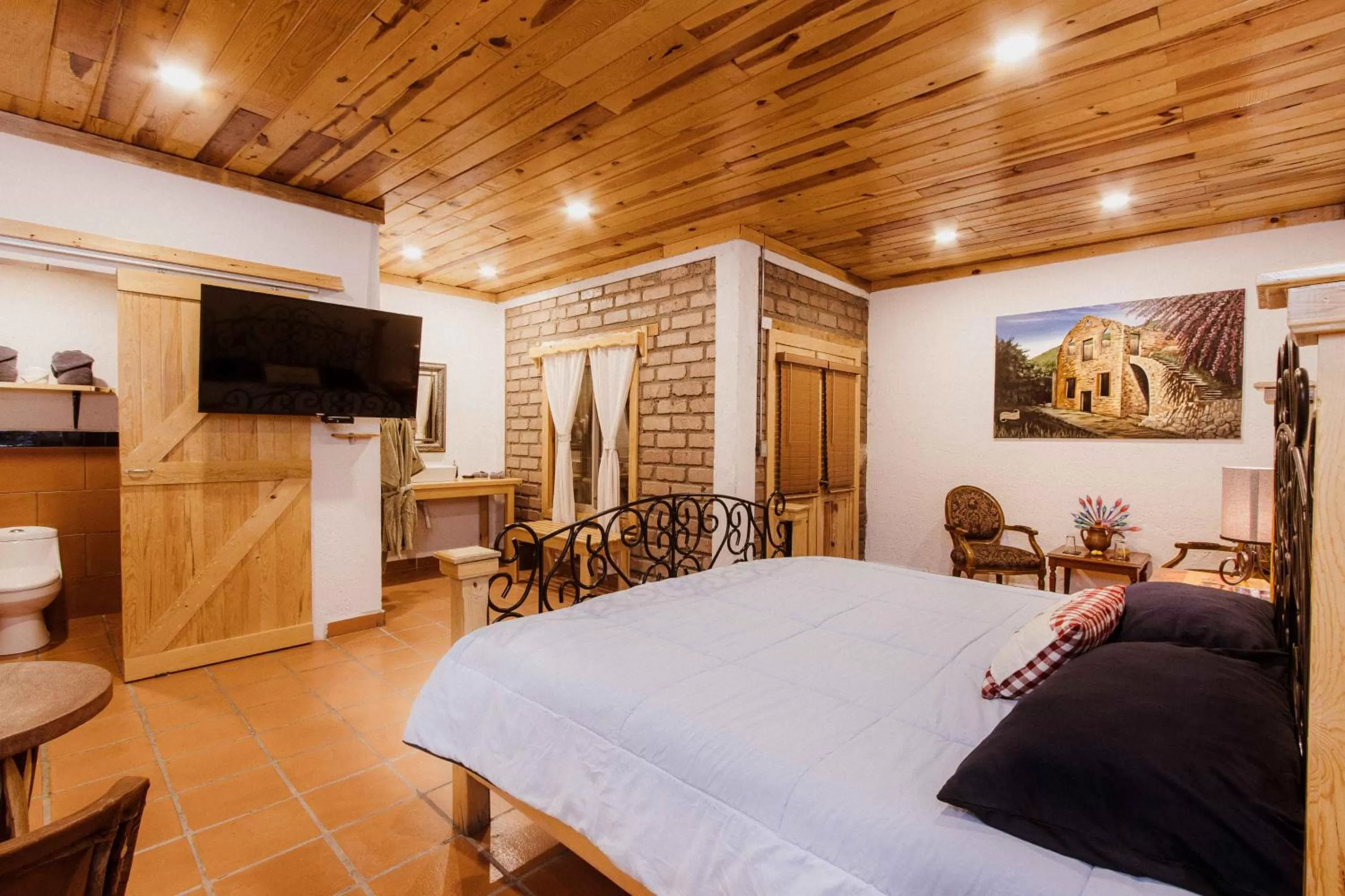 Communal lounge/ TV room, Bed in Hacienda Don Armando Boutique & Spa