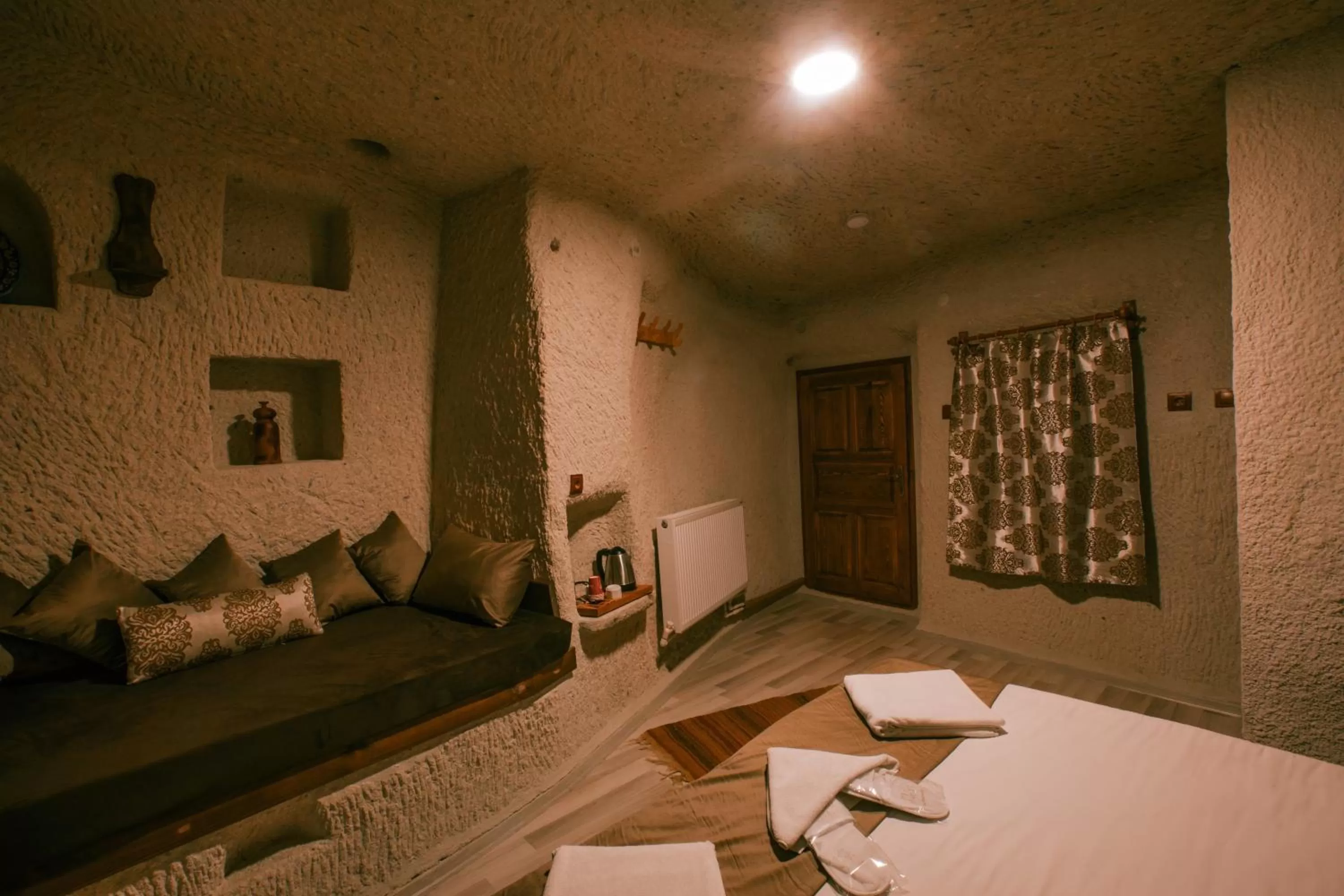 Seating area, Bed in Mia Cappadocia Cave Hotel