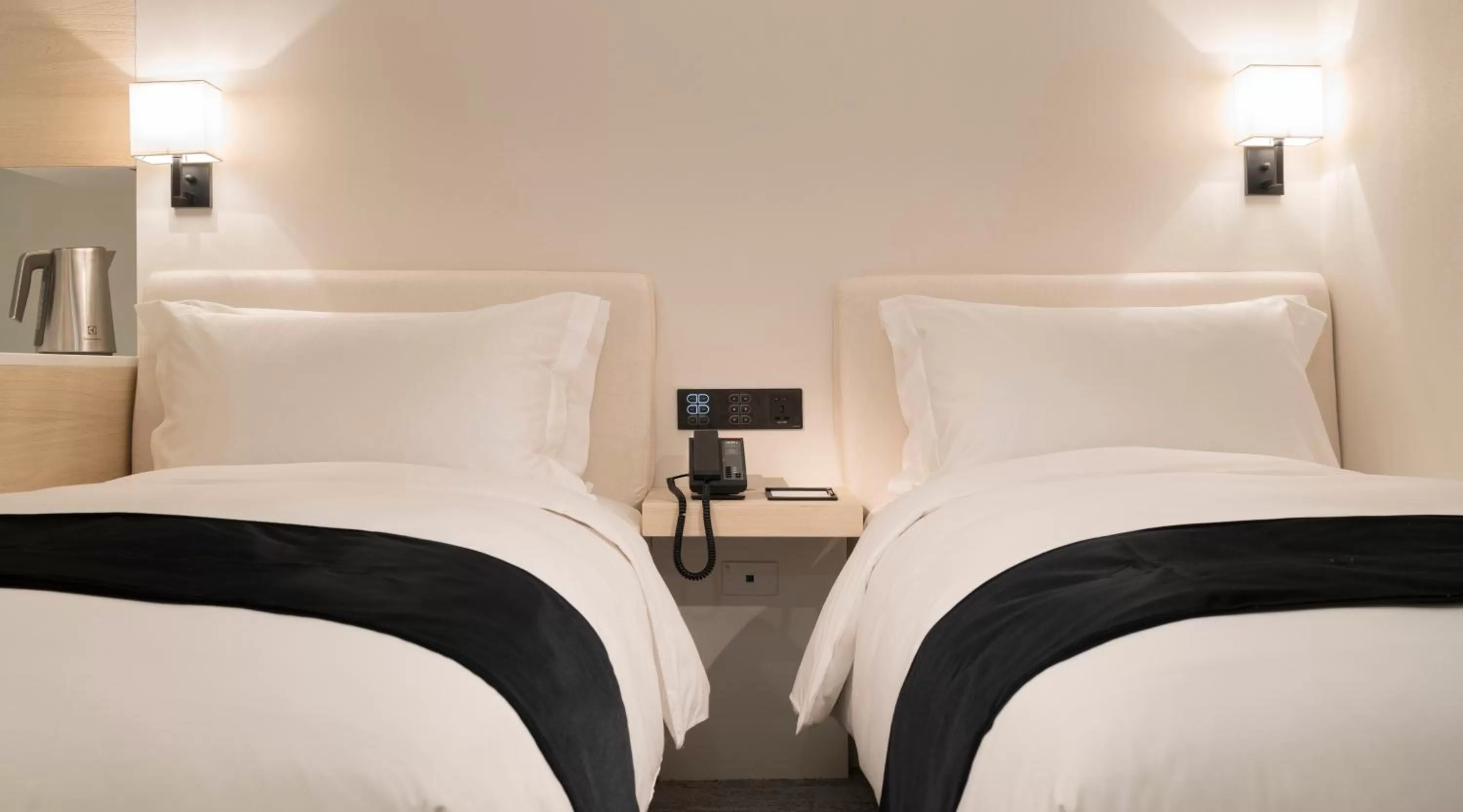 Bed in Swiio Hotel Daan