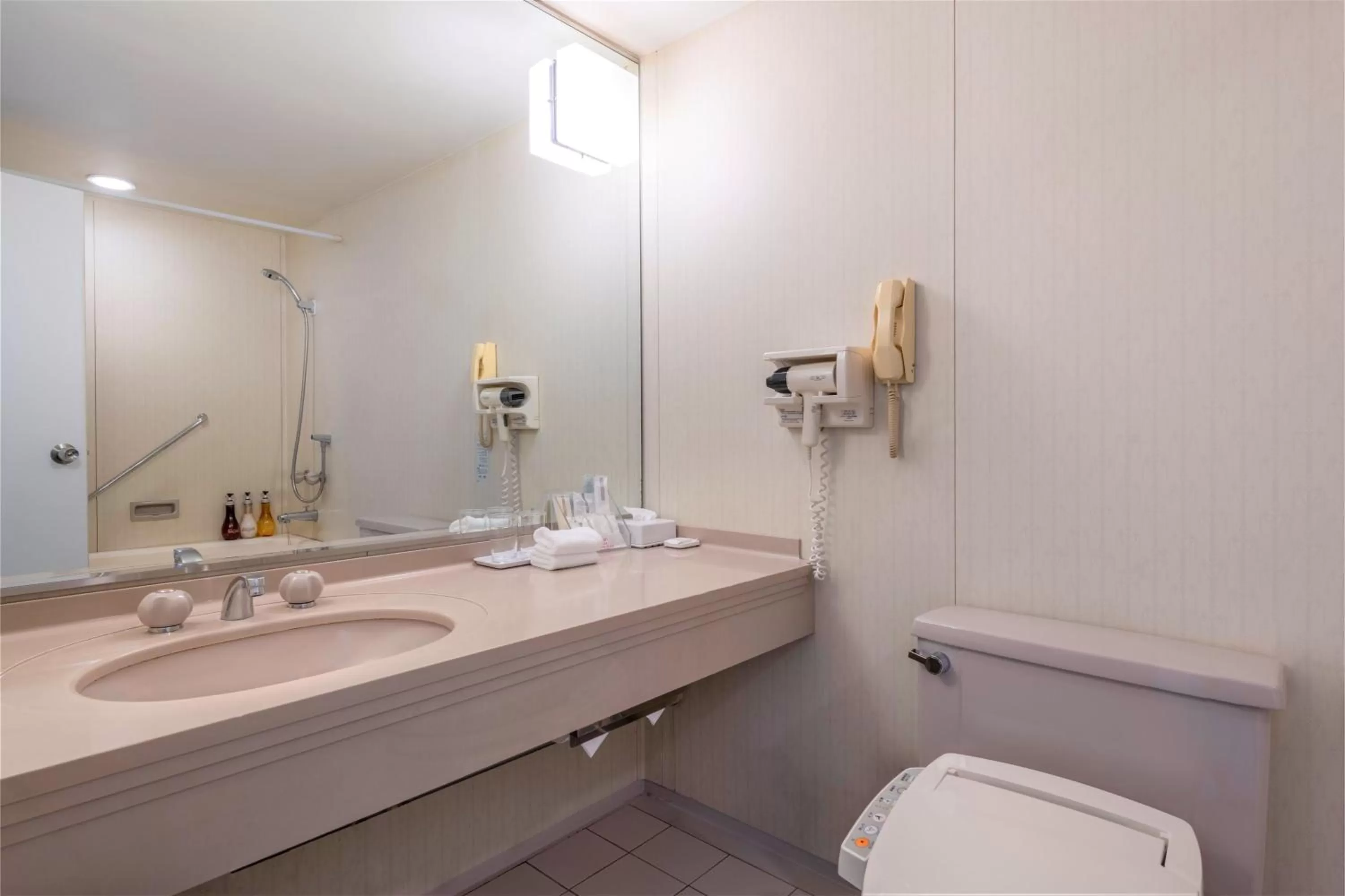 Bathroom in ANA Crowne Plaza Kobe by IHG