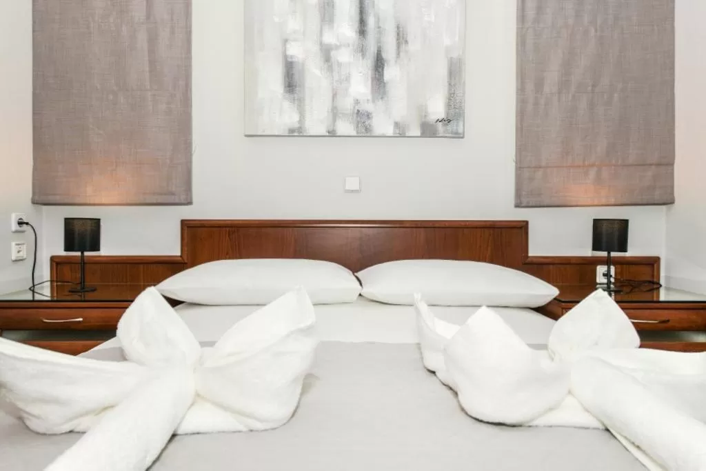 Bedroom in V & G Cozy Apartments