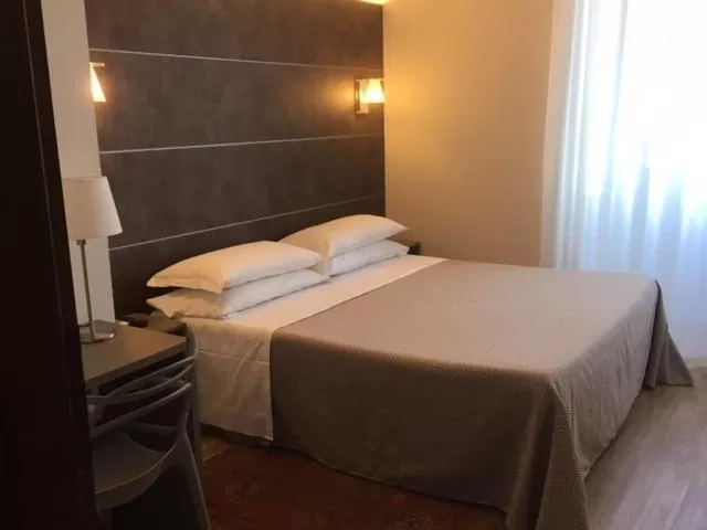 Bed in Hotel La Nuova Rotaia