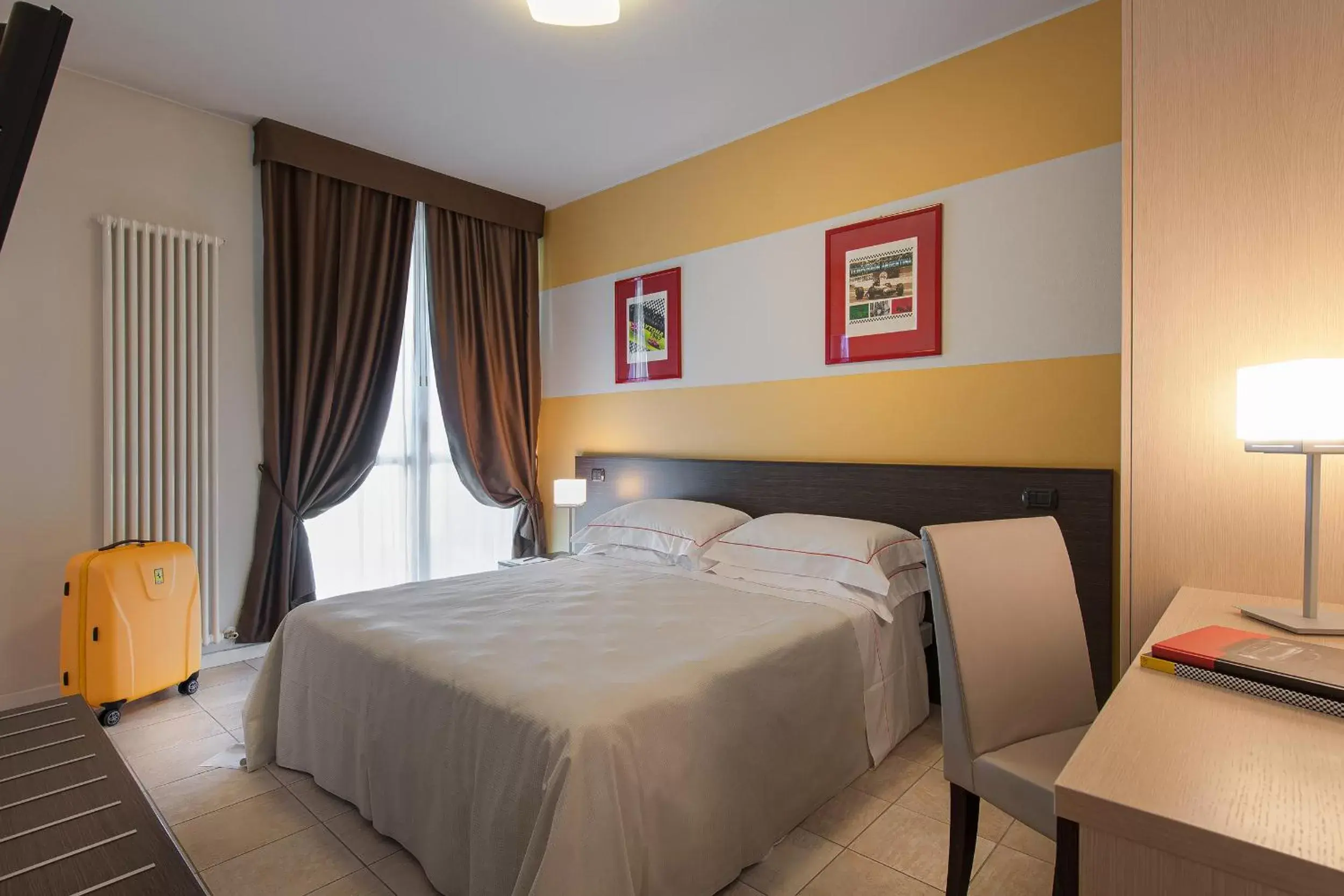 Bed in Hotel Maranello Village