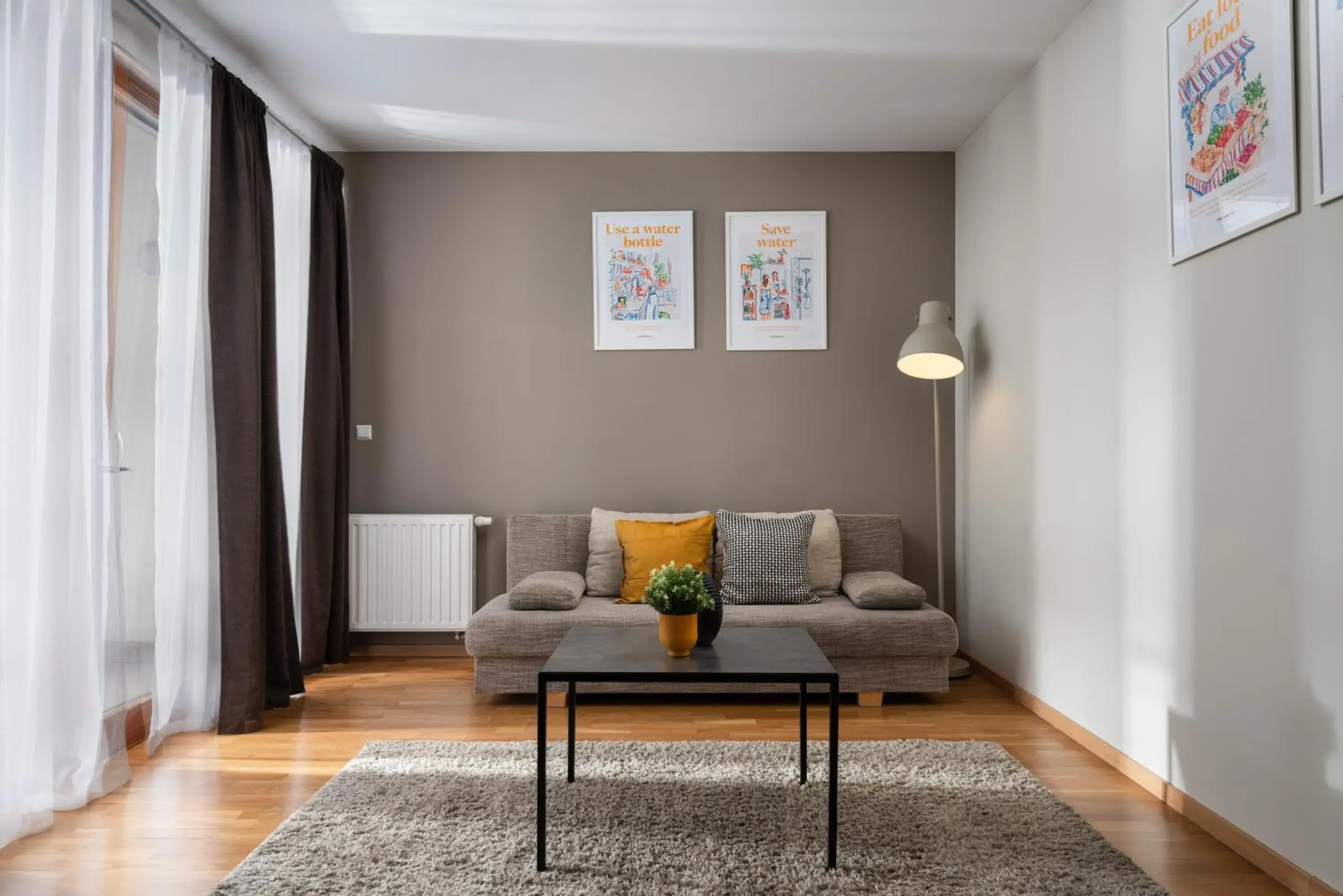 TV and multimedia, Seating Area in Central Passage Budapest Apartments