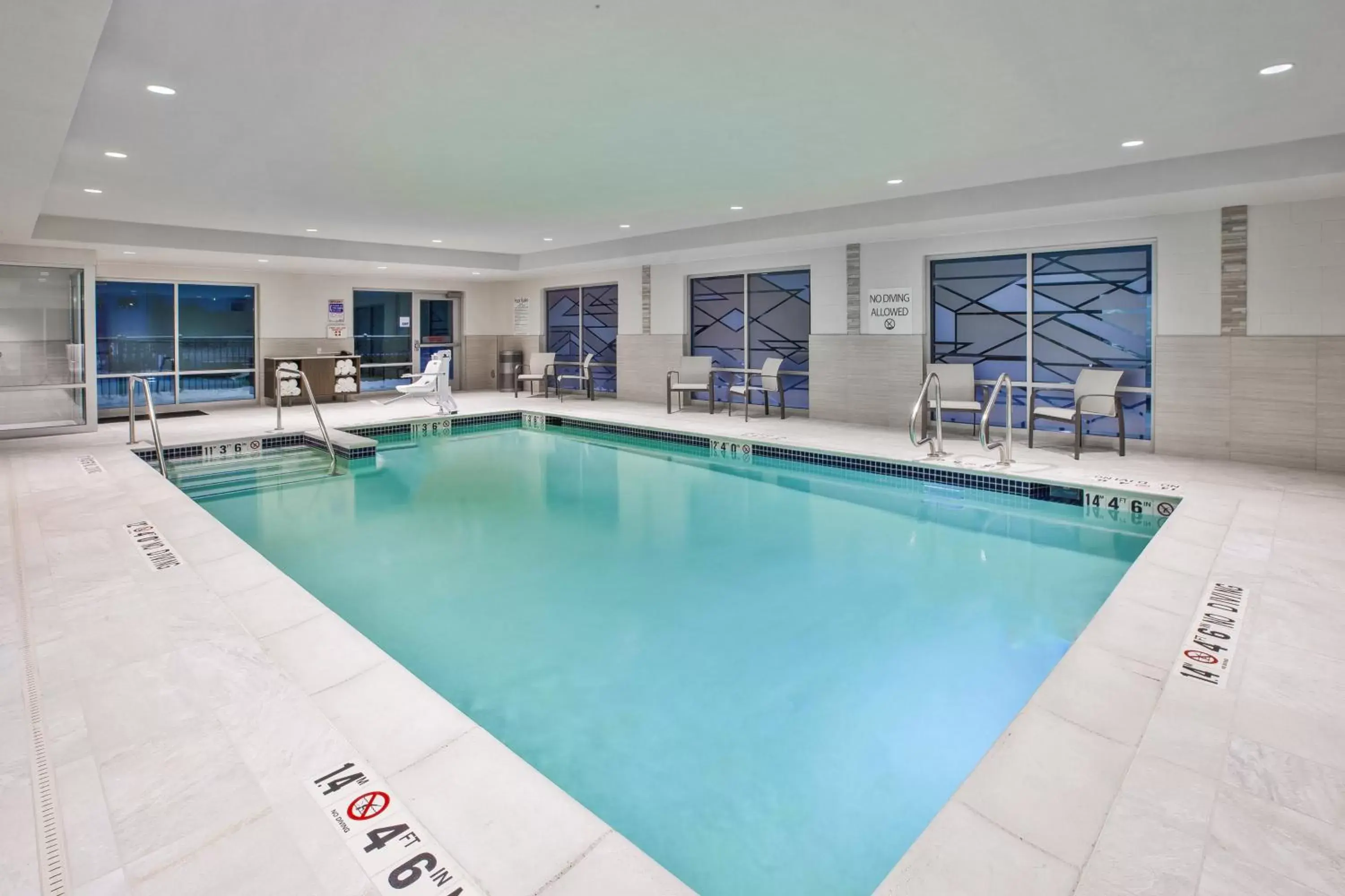 Swimming Pool in Holiday Inn Express & Suites - Okemos - University Area, an IHG Hotel