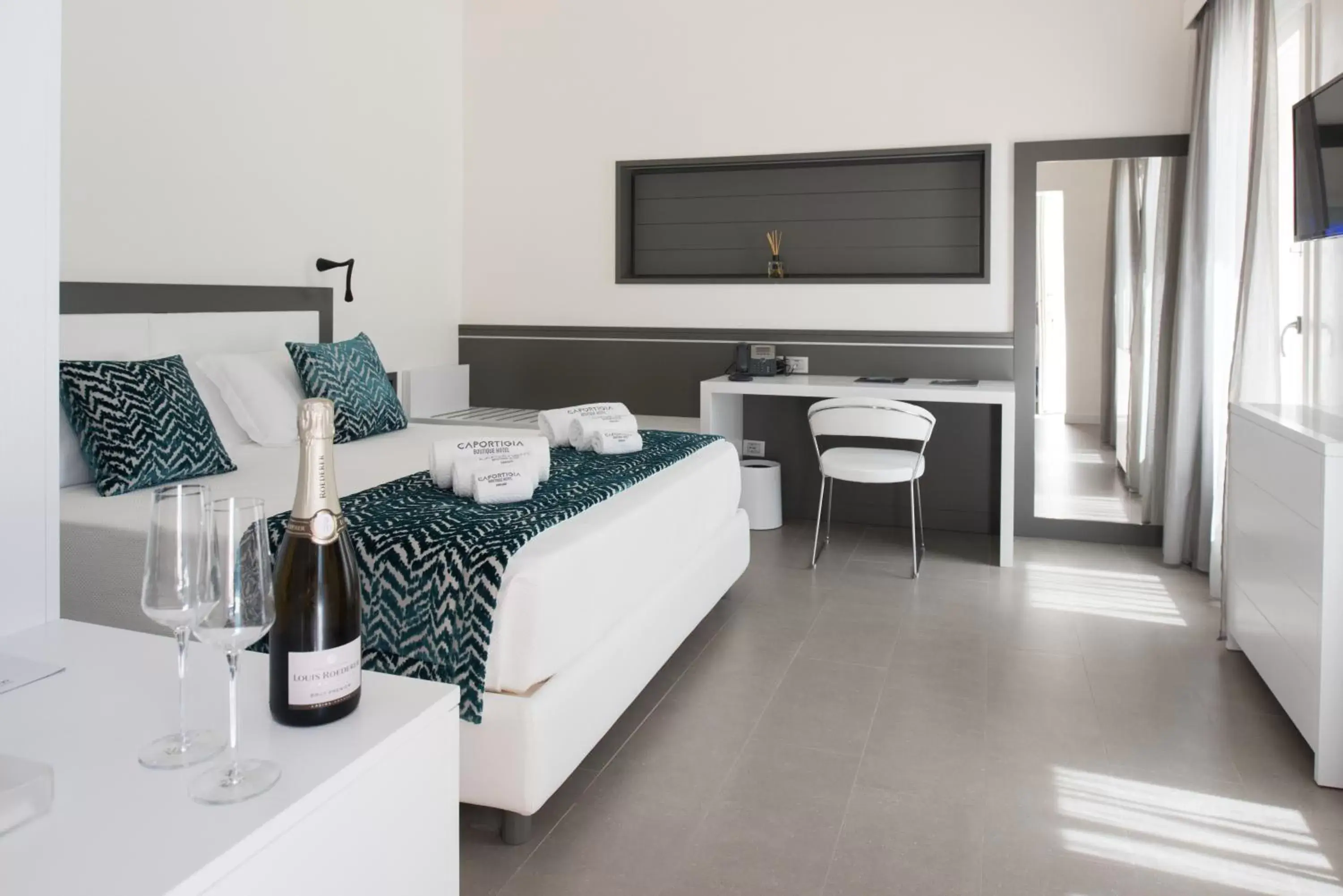 Bed in Caportigia Boutique Hotel