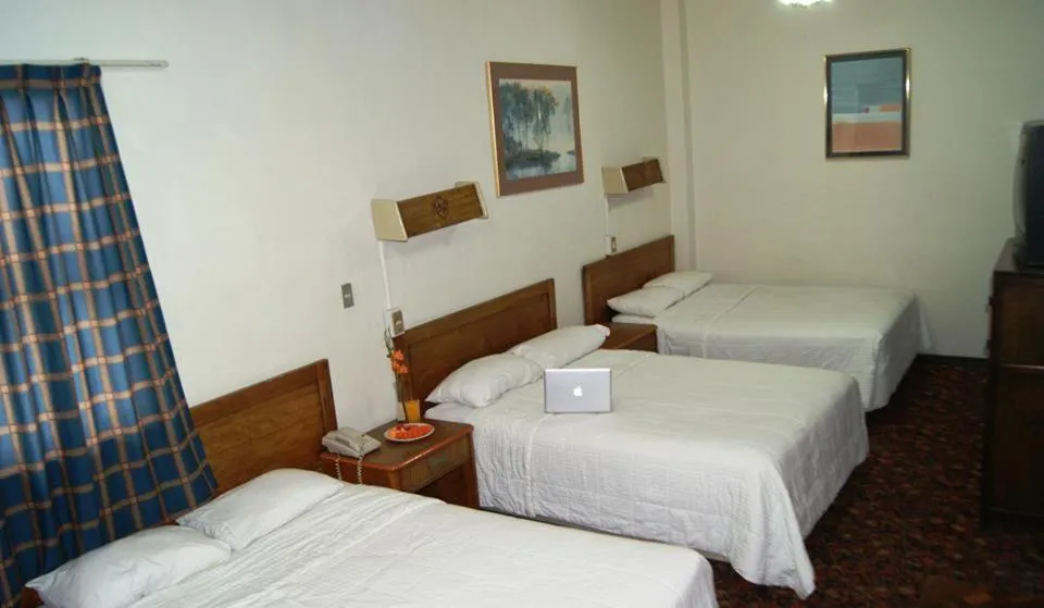 Photo of the whole room, Bed in Hotel Premier Saltillo Coahuila
