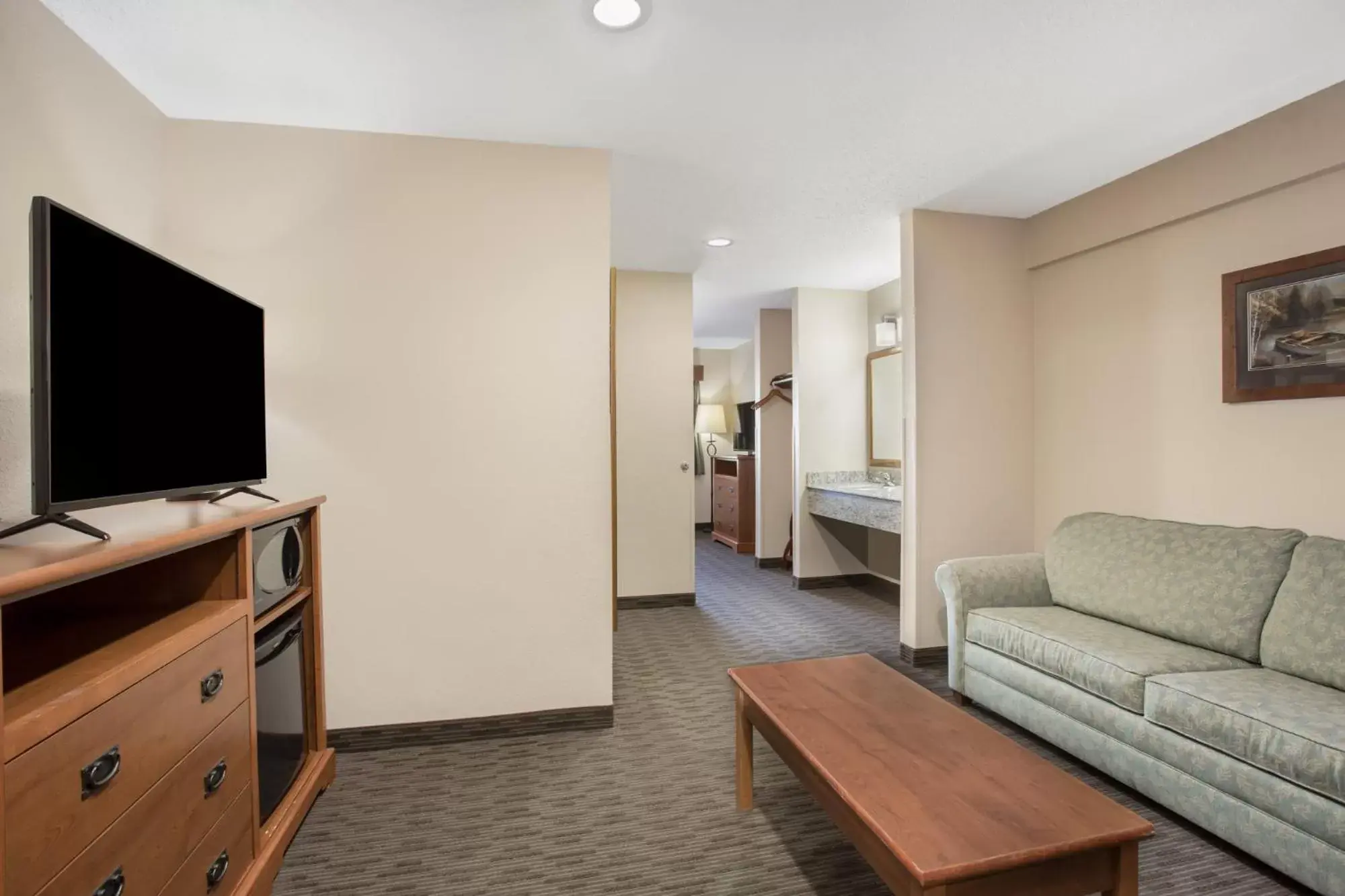 Seating Area in AmericInn by Wyndham Sioux City