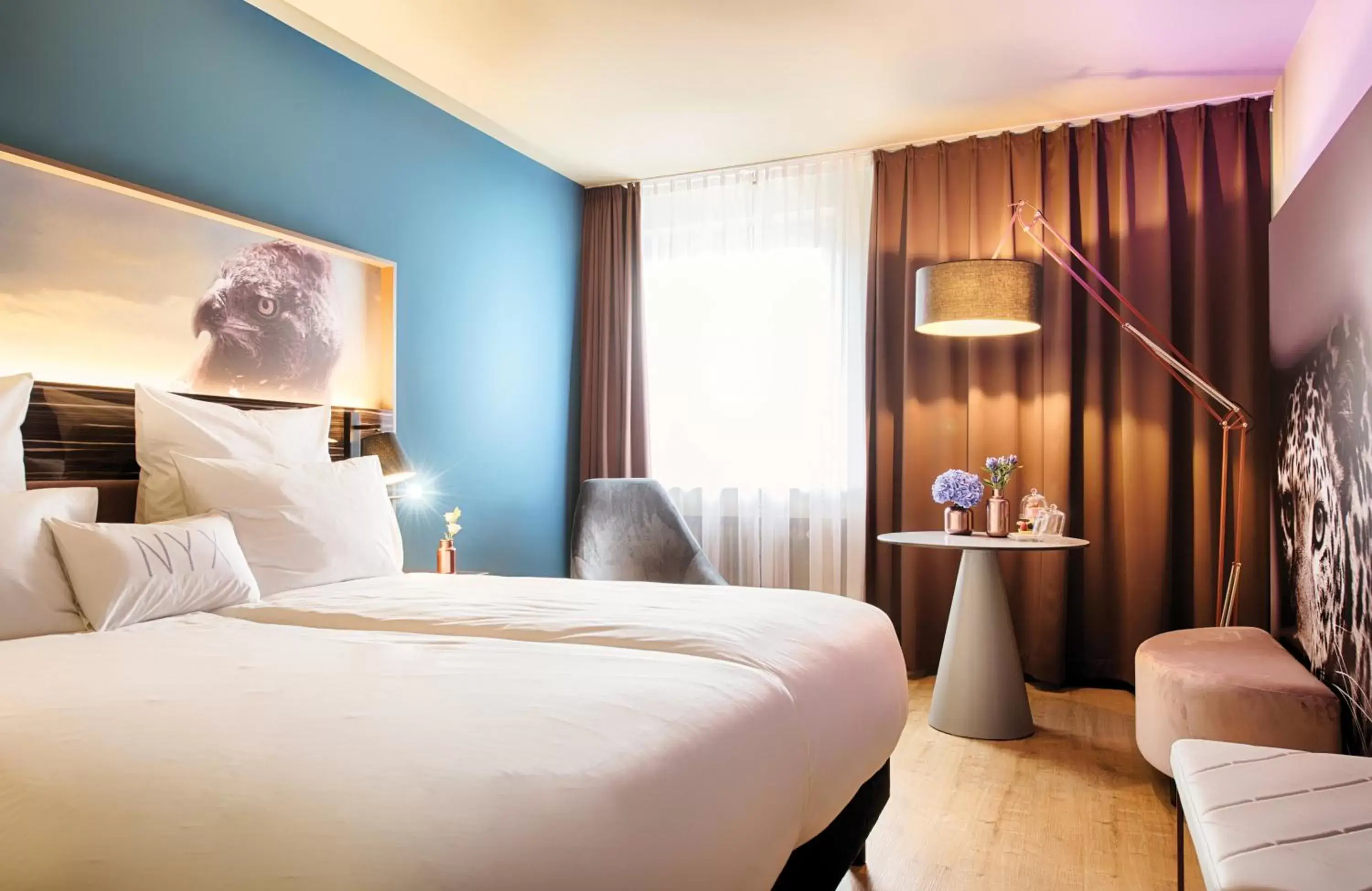 Photo of the whole room, Bed in NYX Hotel Mannheim by Leonardo Hotels