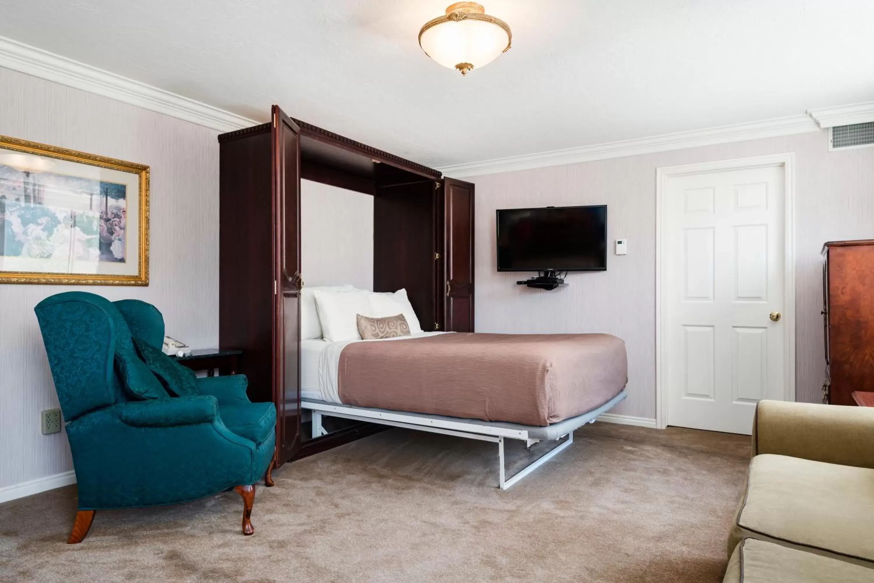 Living room, TV/Entertainment Center in The Kimball at Temple Square