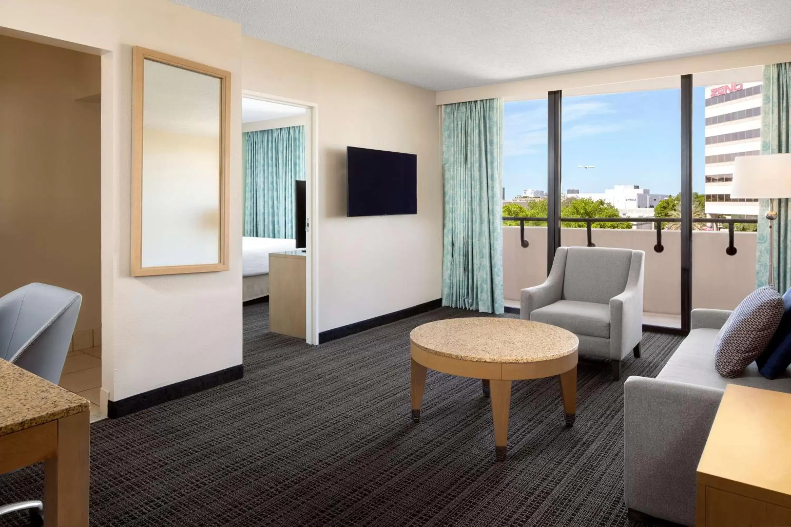 Living room, Seating Area in Embassy Suites by Hilton Tampa Airport Westshore