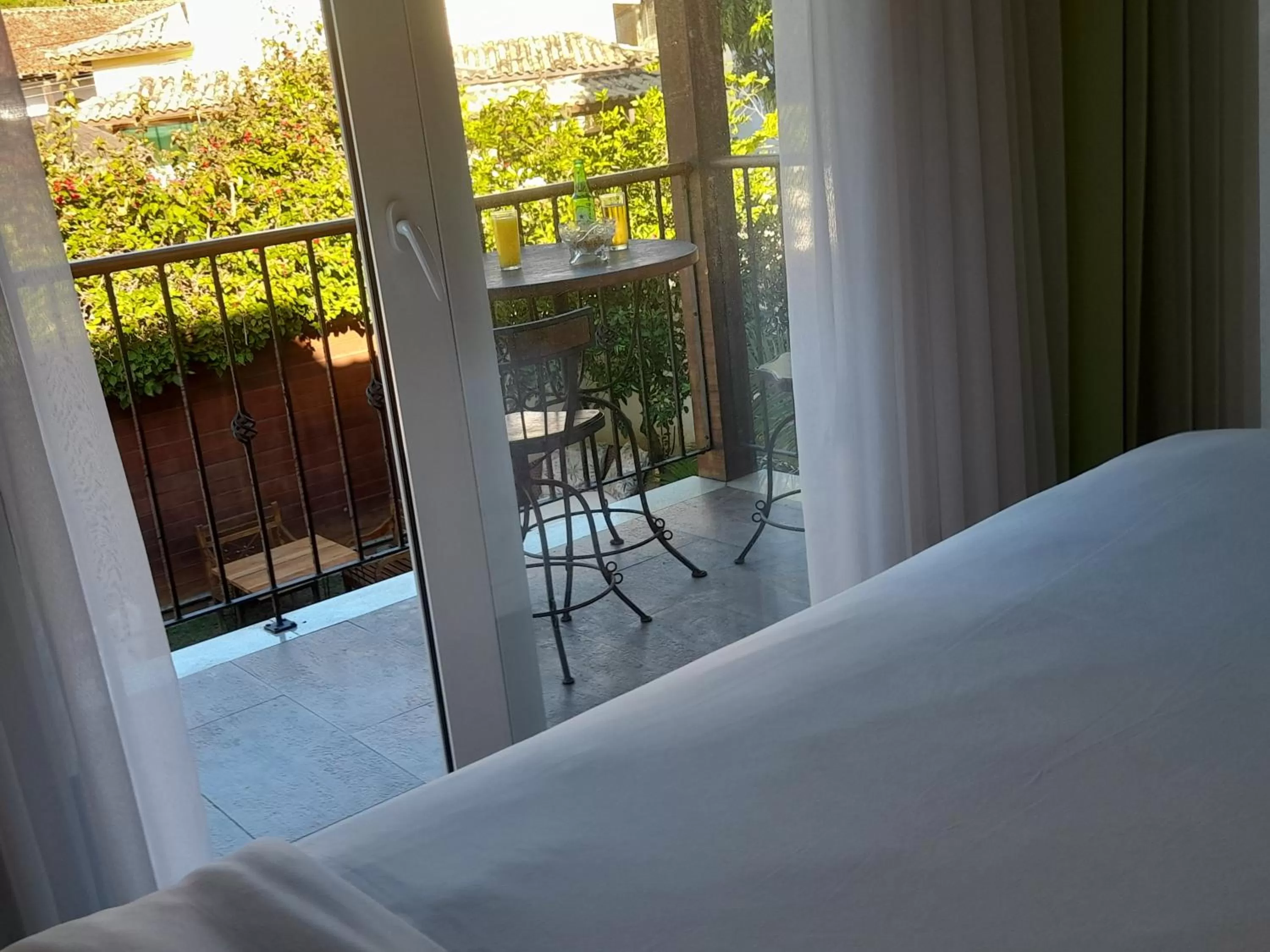 View (from property/room), Bed in Parador Búzios Boutique Hotel