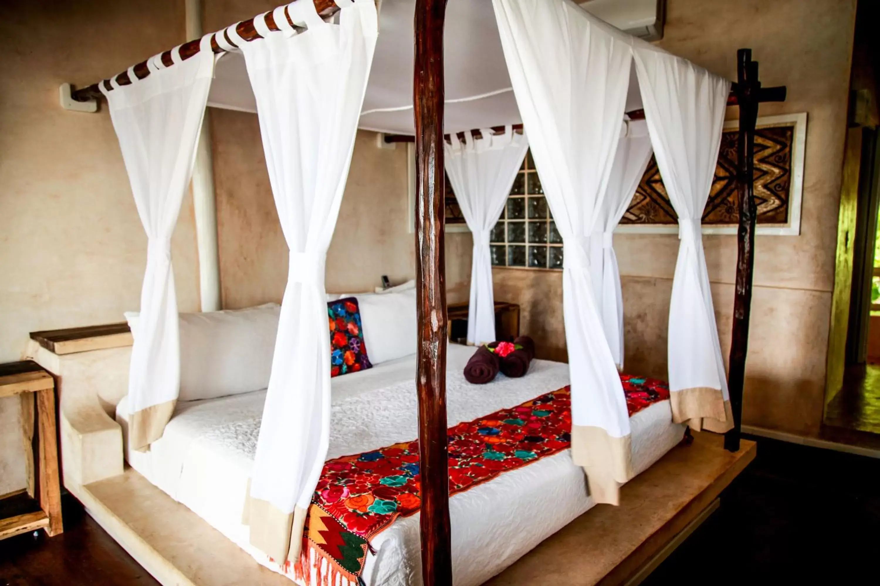 Bed in Villa Las Estrellas Tulum - located at the party zone