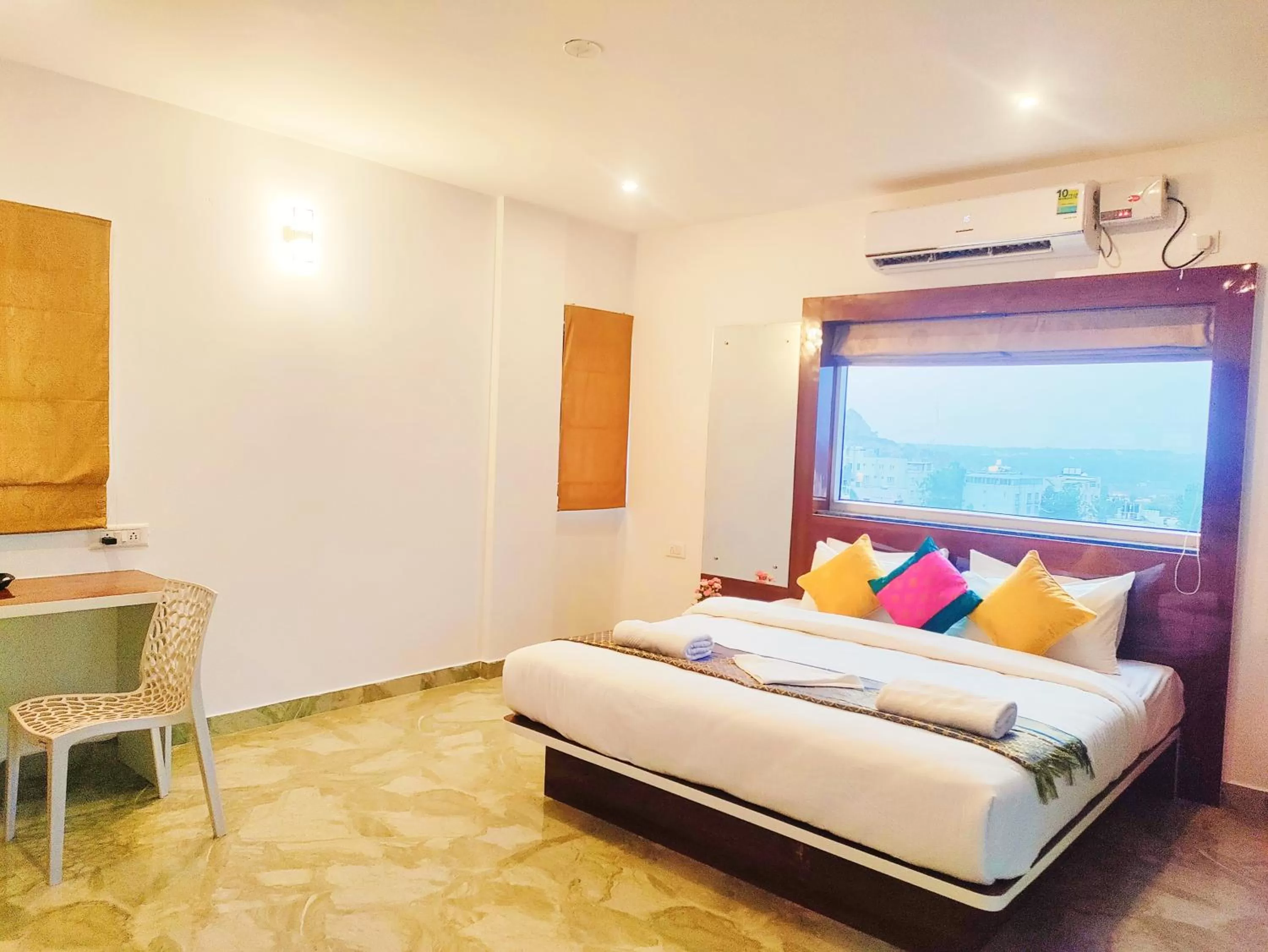 Bedroom in Keerthis Royal Suites - Hotel Near Kempegowda International Airport