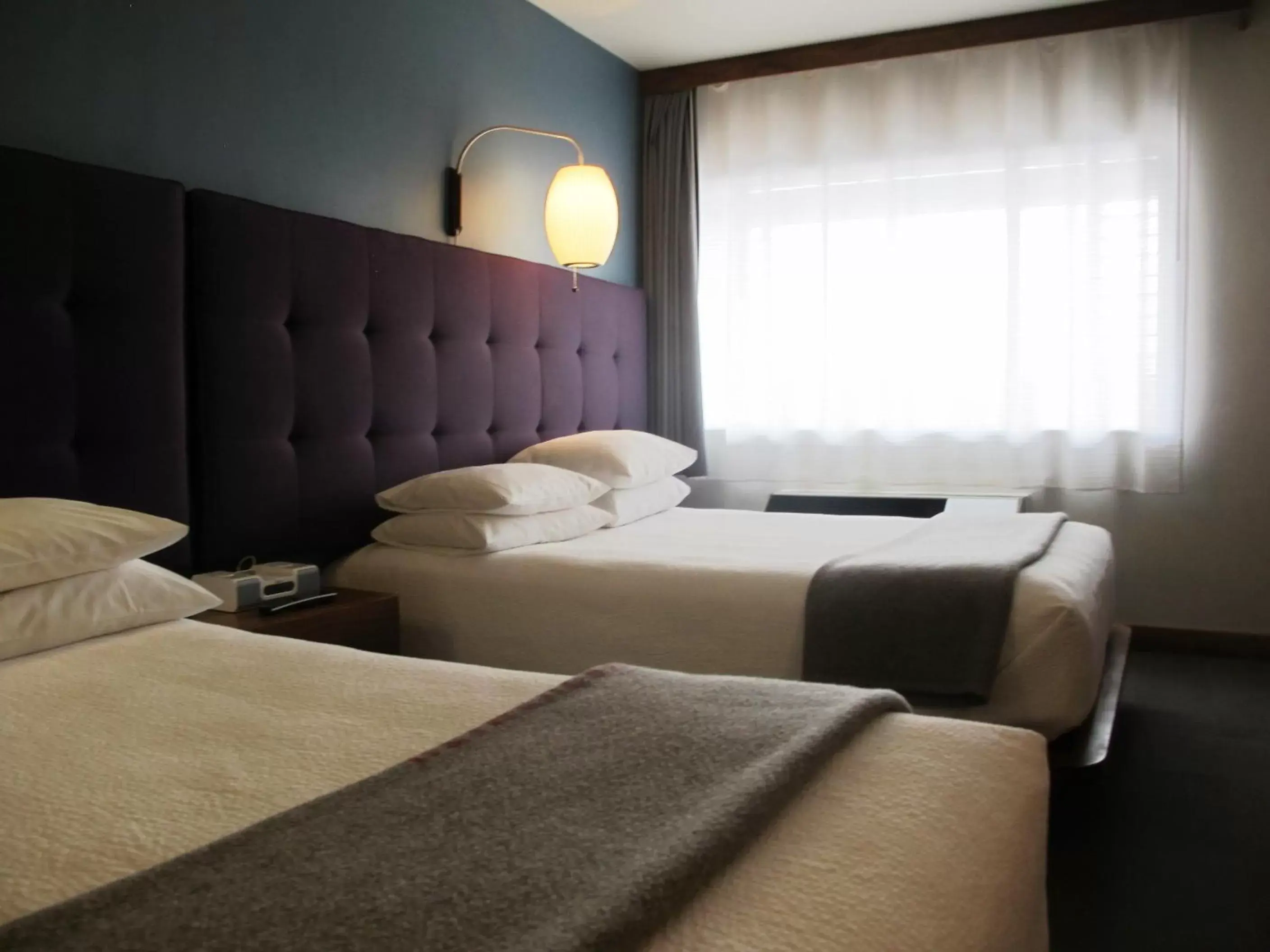 Queen Room with Two Queen Beds in Modern Hotel