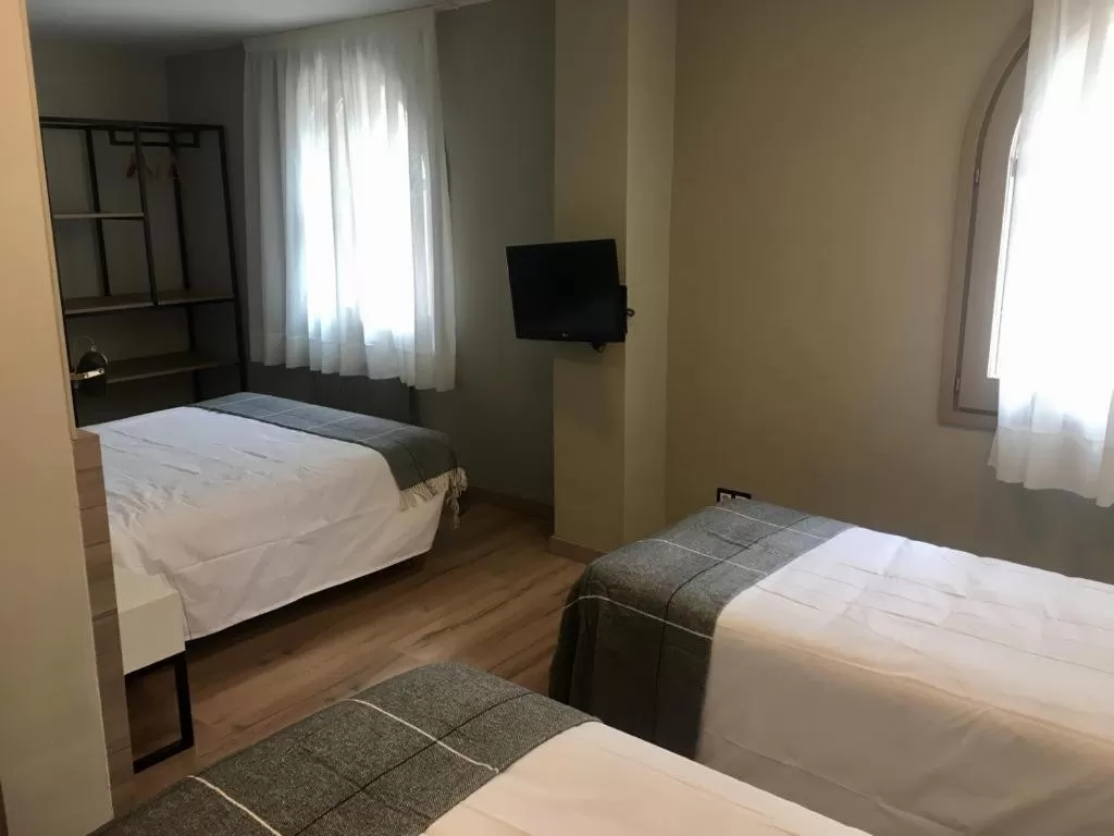 Bed in Hotel Torres Manlleu