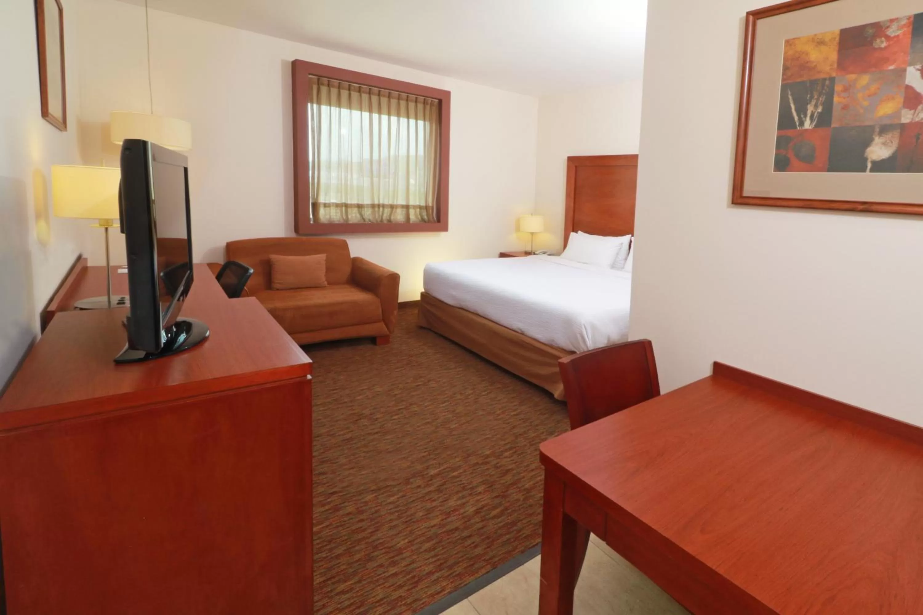 Photo of the whole room, Bed in Staybridge Suites Queretaro by IHG