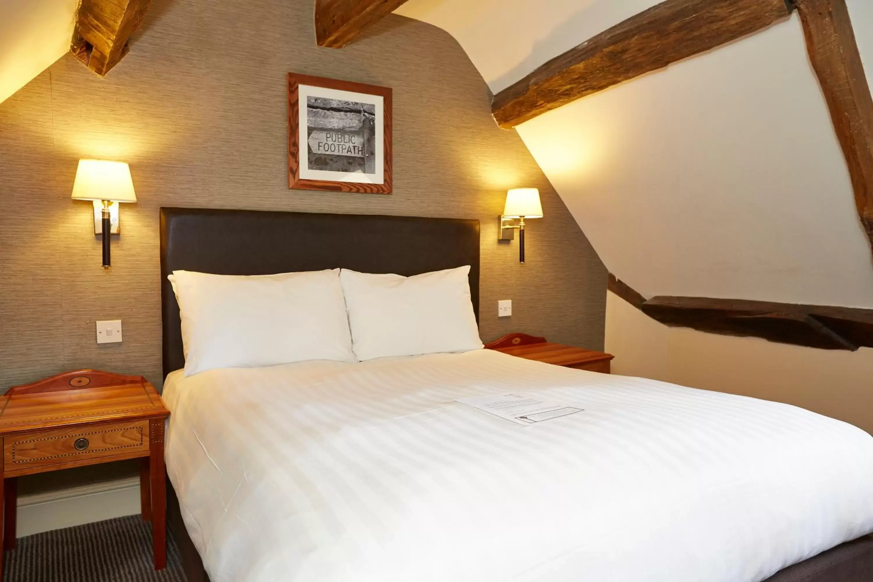 Bed in Woolpack Inn by Greene King Inns