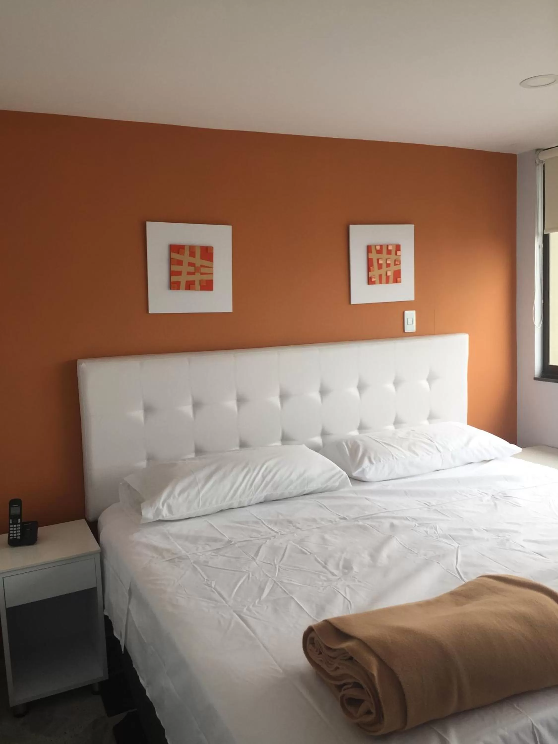 Bed in Hotel Garden City Boutique