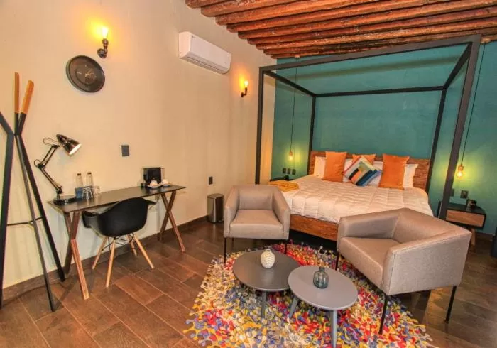 Bed in Antigua Trece Hotel Fusión