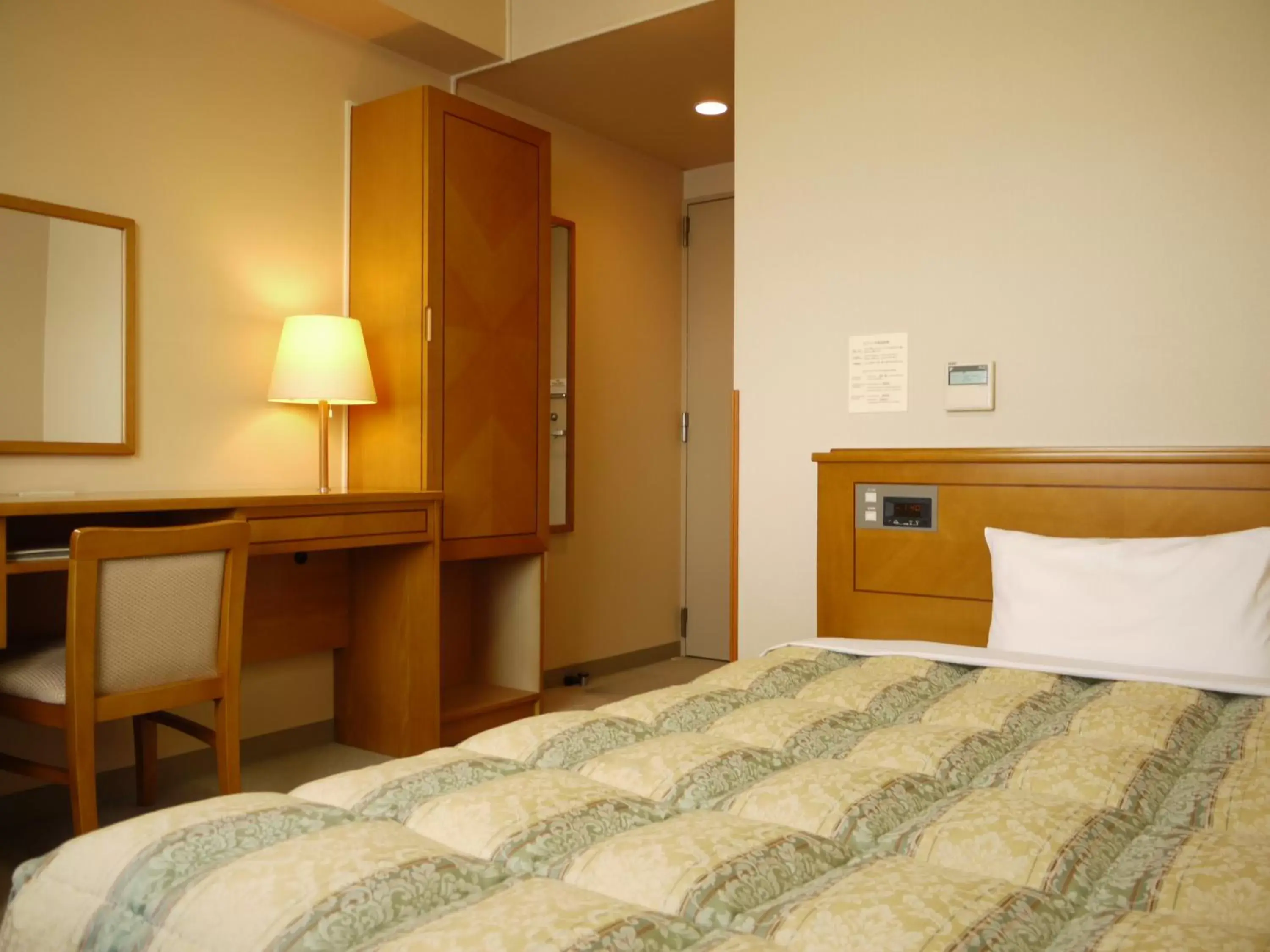 Bed in Hotel Route-Inn Jouetsu
