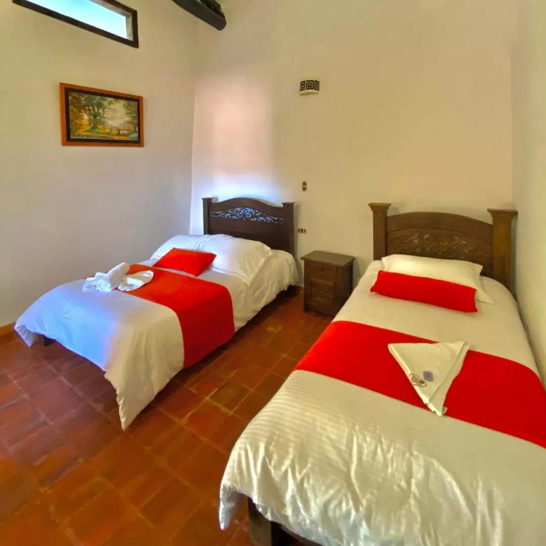 Bed in Hotel Hacienda Santa Barbara