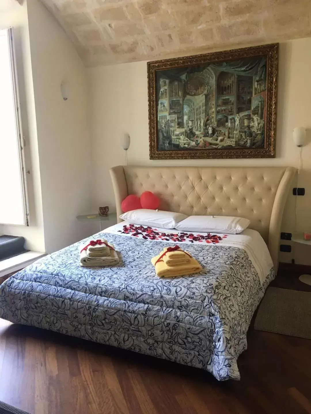 Bed in Alla dimora di Chiara Suite and Rooms
