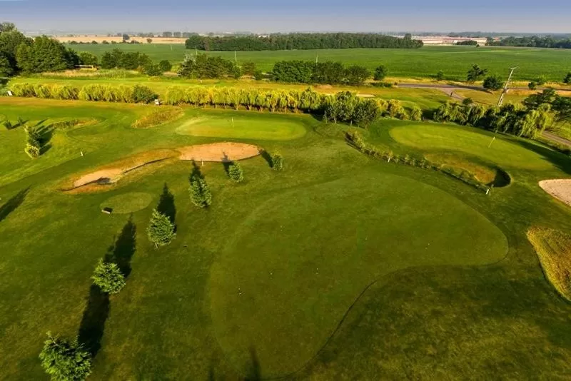 Golfcourse, Bird's-eye View in Spa & Pool Apartment Hotel - Restaurant VILLA IVICA