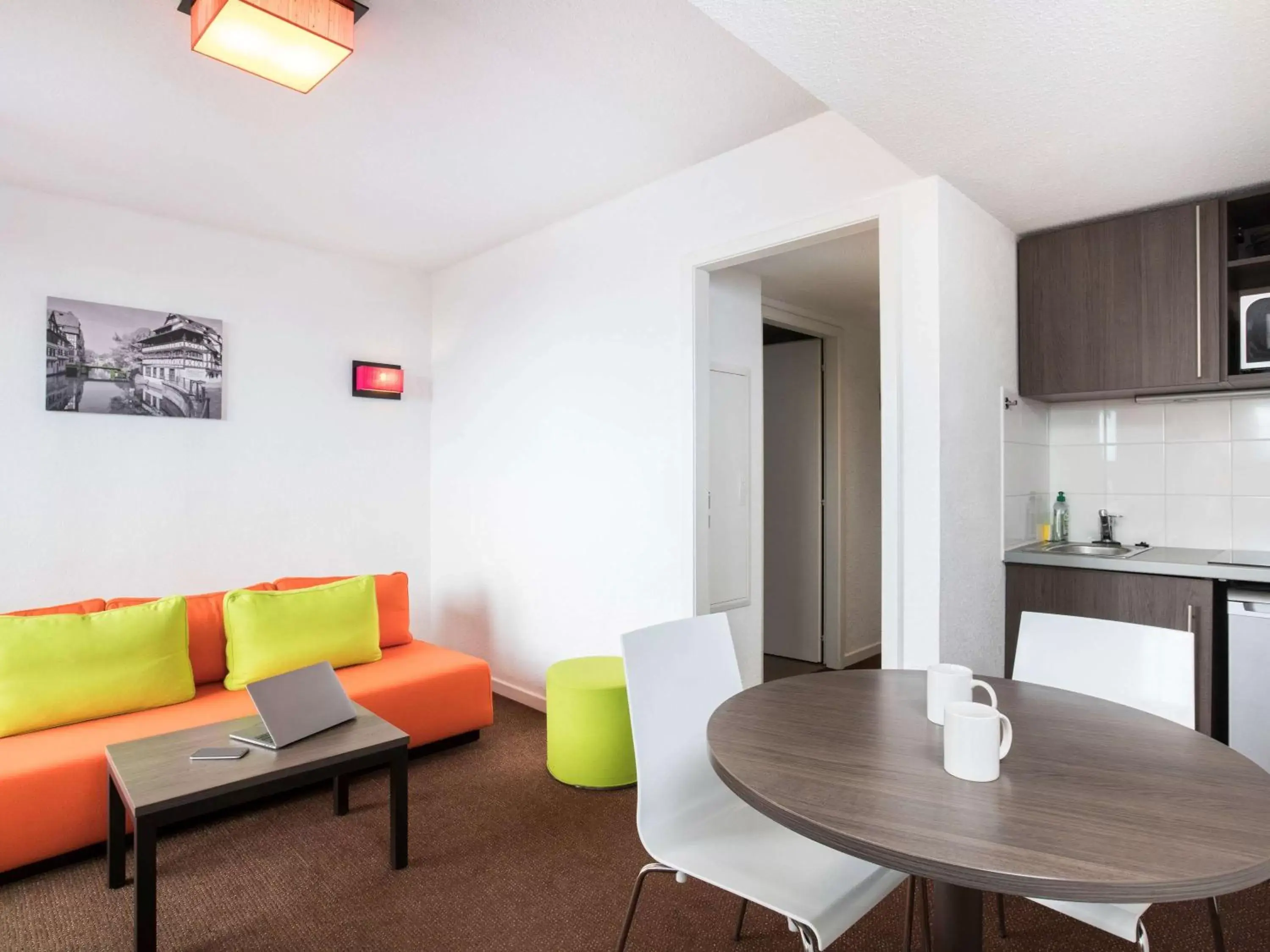 Photo of the whole room, Seating Area in Aparthotel Adagio Access Strasbourg Petite France