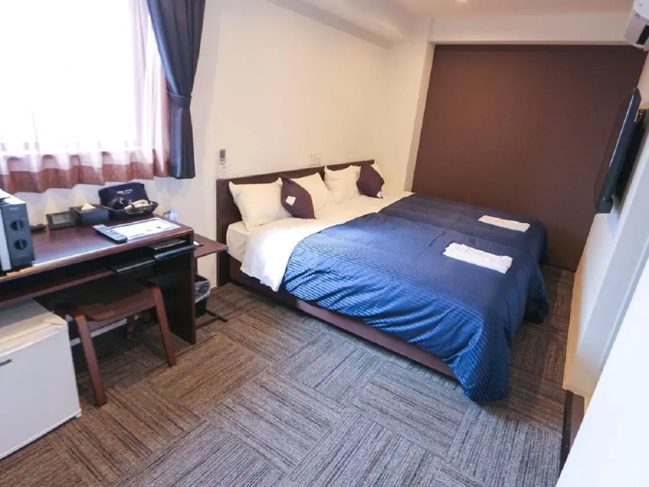 Bed in HOTEL LiVEMAX Chiba-Ekimae